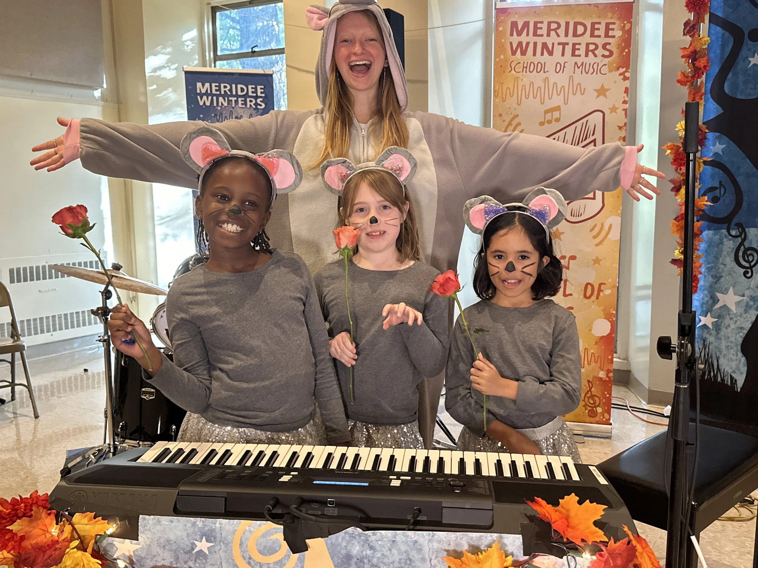 Teacher Lauren and three students