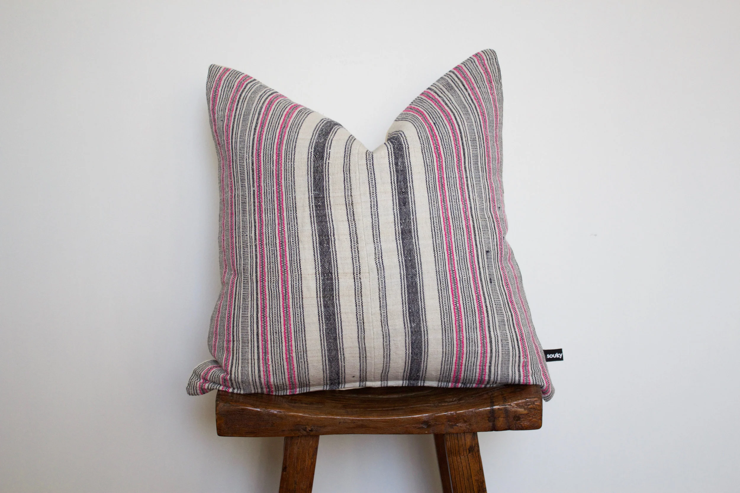 Finley - No. 138 350 RMB Pillow cover is made from handwoven hemp fabric sourced from Northern Thailand Size: Roughly 50x50 cm Pillow back is made from a neutral cotton/linen blend Zipper on bottom of pillow Down insert included Hand wash in cold water