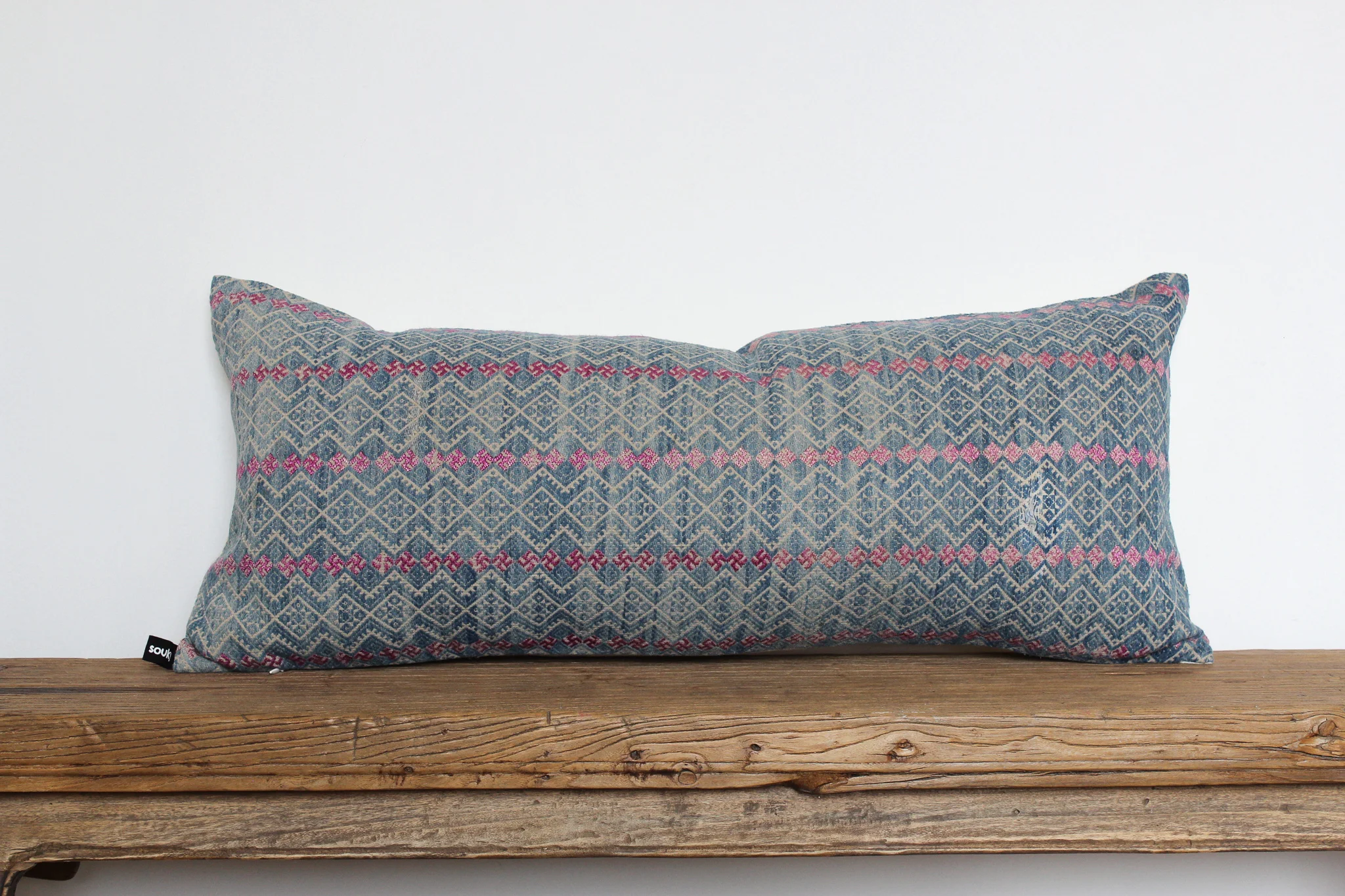 Ariel - No. 502 400 RMB Pillow cover is made from embroidered fabric used in traditional wedding blankets in southern China Size: Roughly 29x69 cm Pillow back is made from a neutral cotton/linen blend Zipper on bottom of pillow Down insert included Hand wash and spot treat