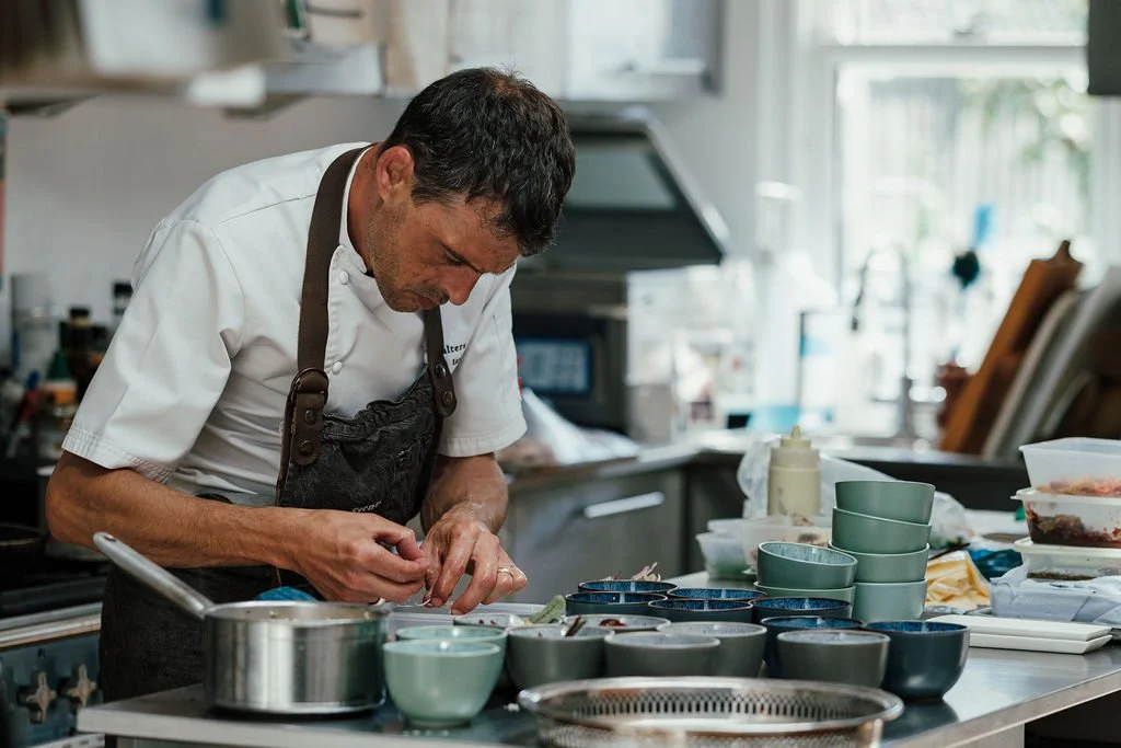Ian Salter creating bowl food