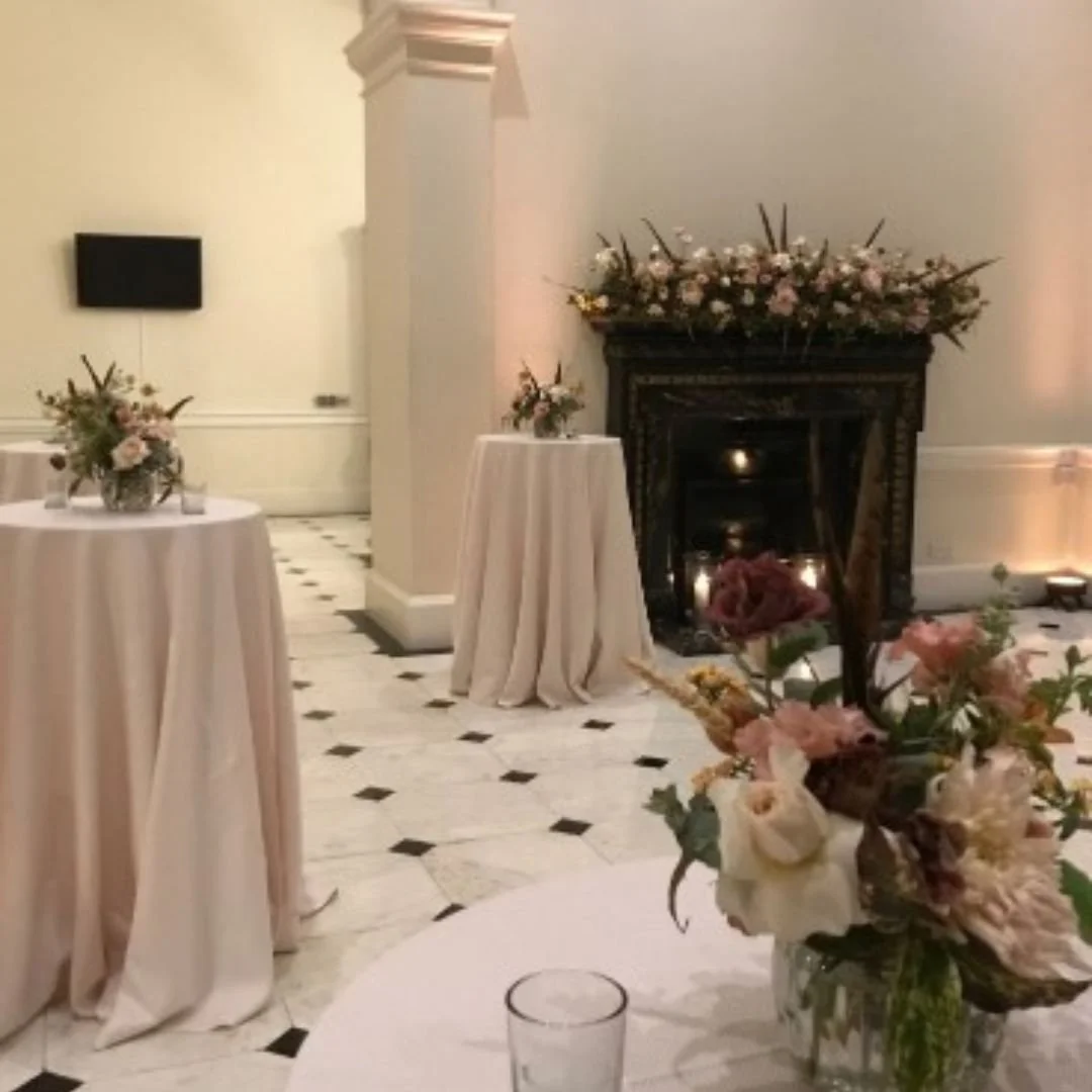 Kent House Knightsbridge cream poseur tables and fireplace.jpg