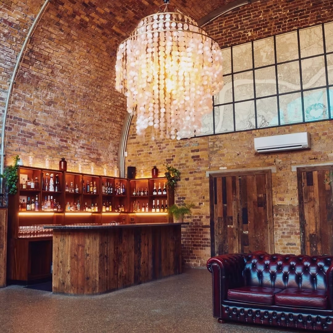 100 Barrington chandelier, bar, chesterfield.jpg