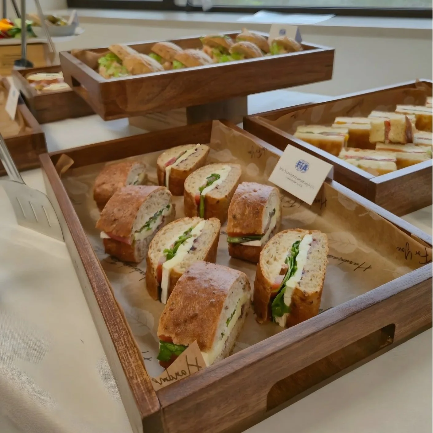 Salters Events deli style sandwiches on a white clothed table