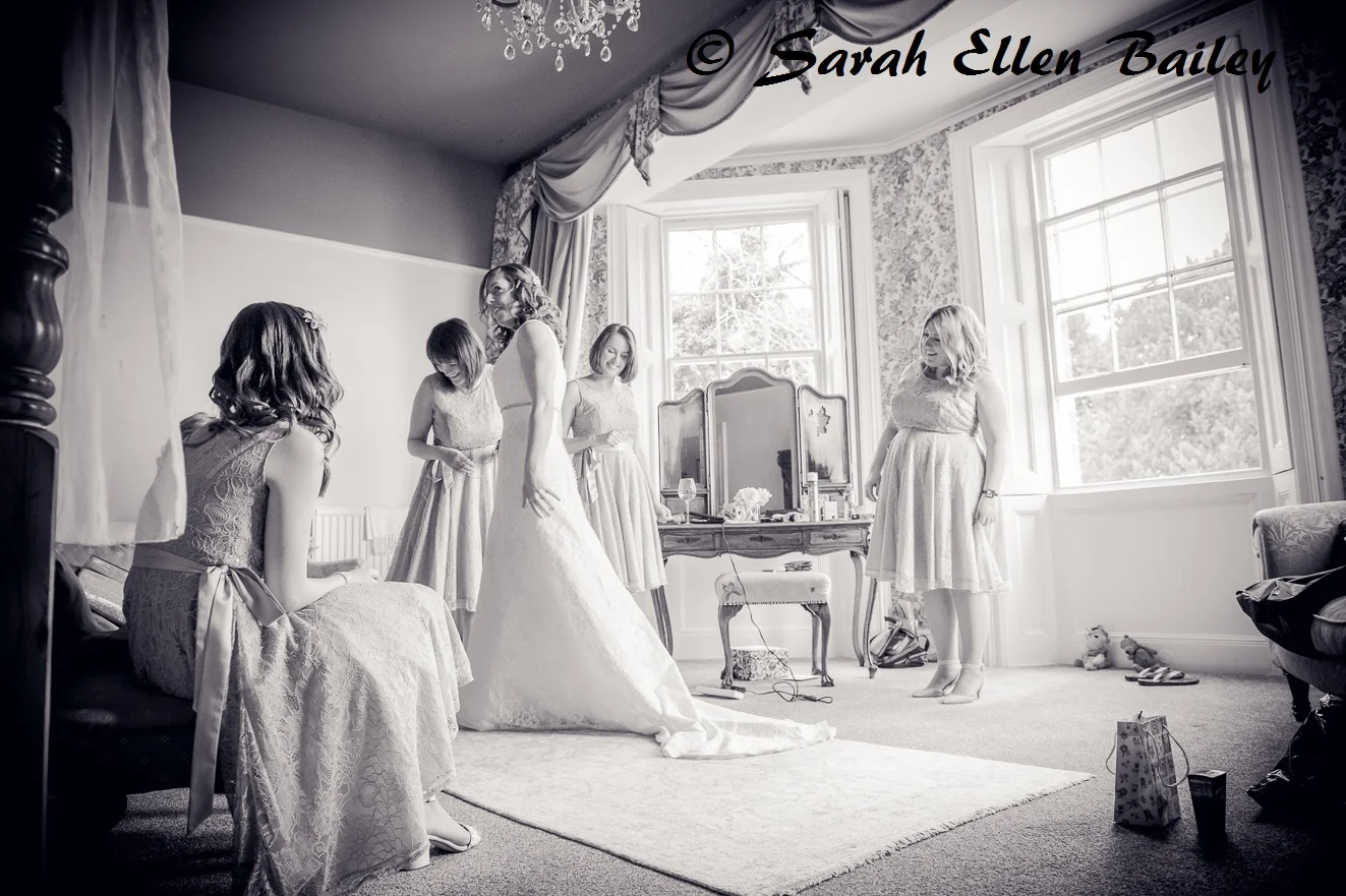 Bride and bridesmaids getting ready in the bridal suite at Skendleby Hall