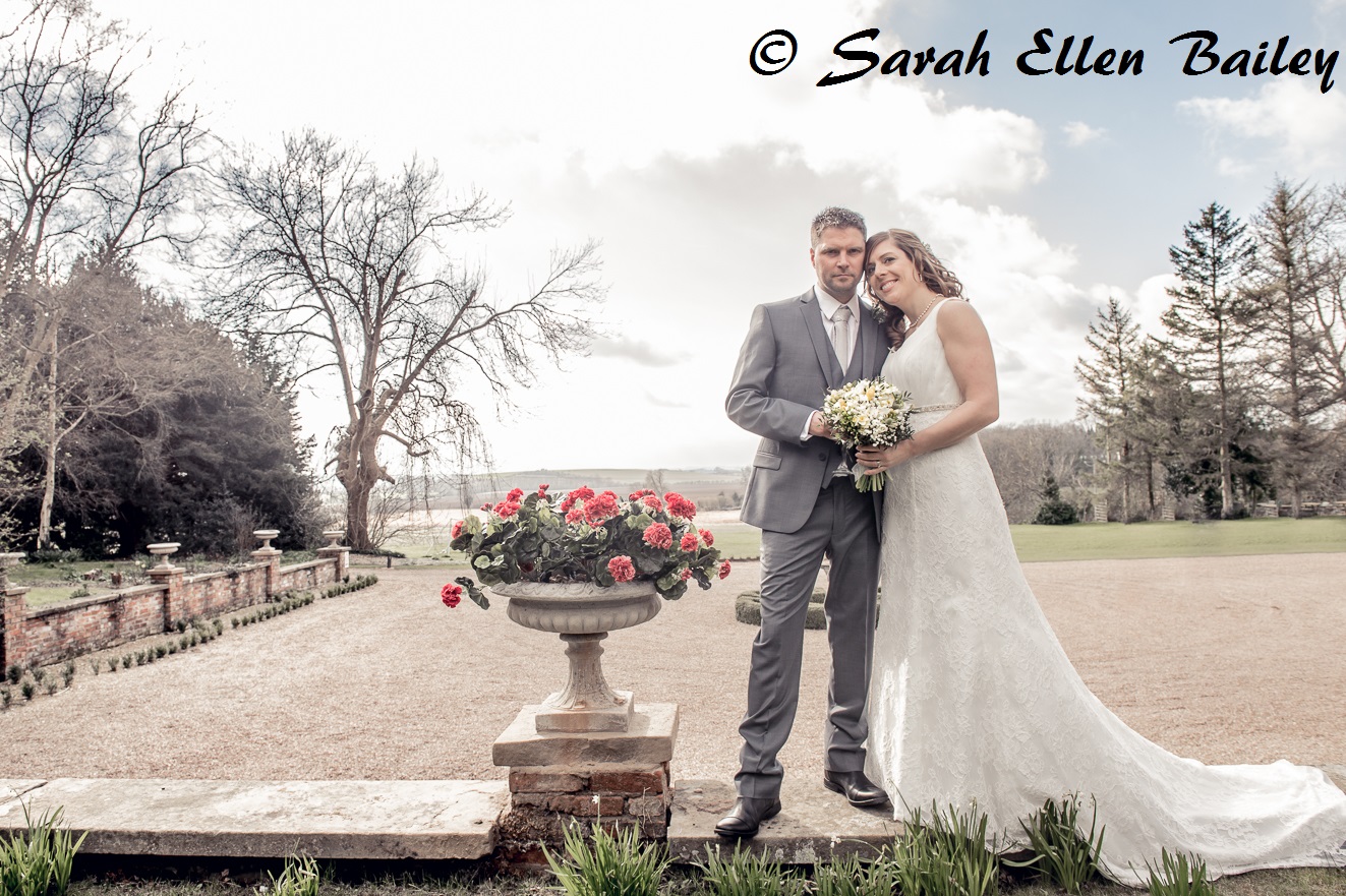 Bride and Groom wedding photograph overlooking the view from Skendleby Hall