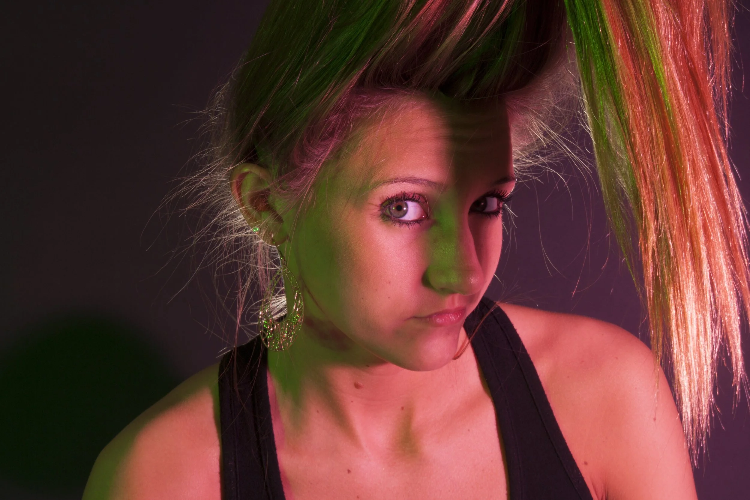 Self Portrait using red and green studio lighting for a contrasting mood.&nbsp;