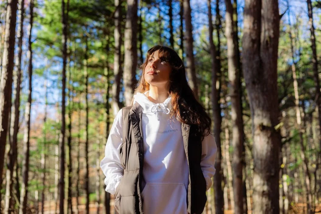 young-woman-enjoying-nature-in-forest