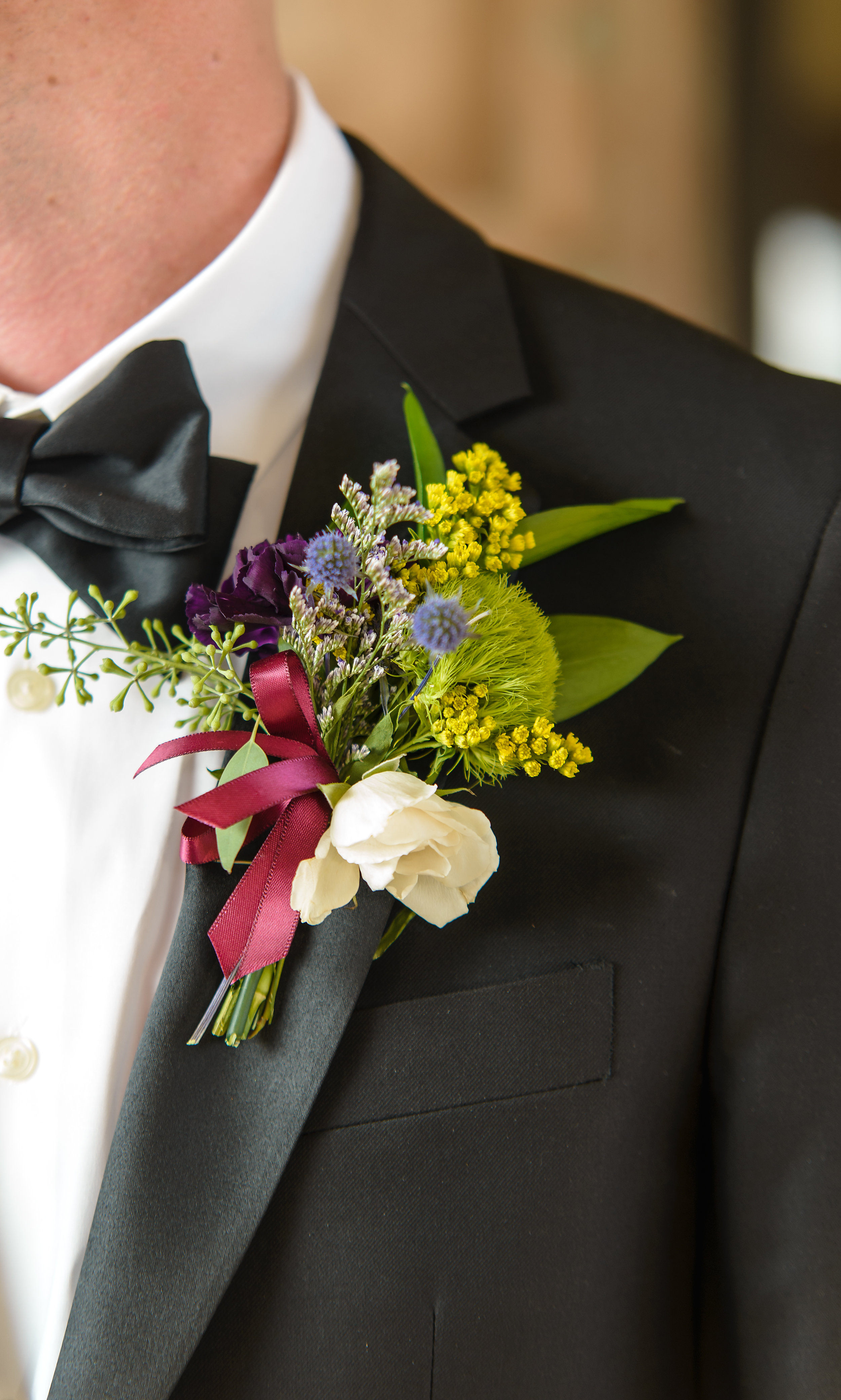 Photographer in OKC Boutonniere Paisley and Peonies The Palace Event Center