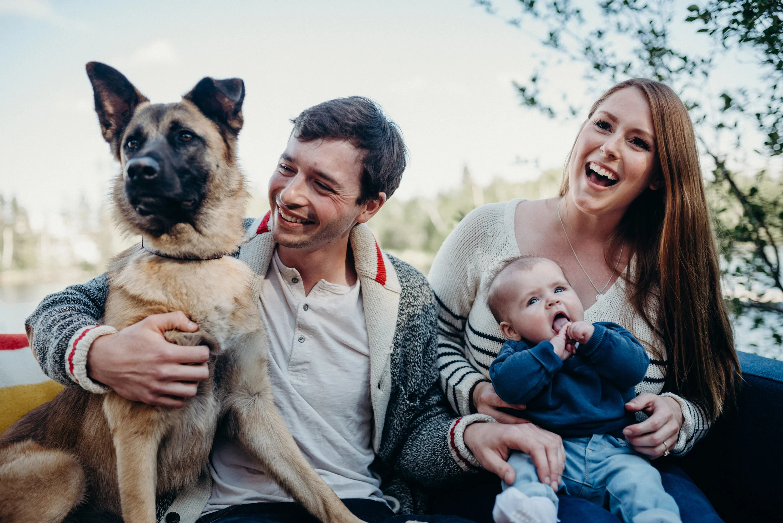 Wrangling a puppy and a baby together for a photo was no easy task.