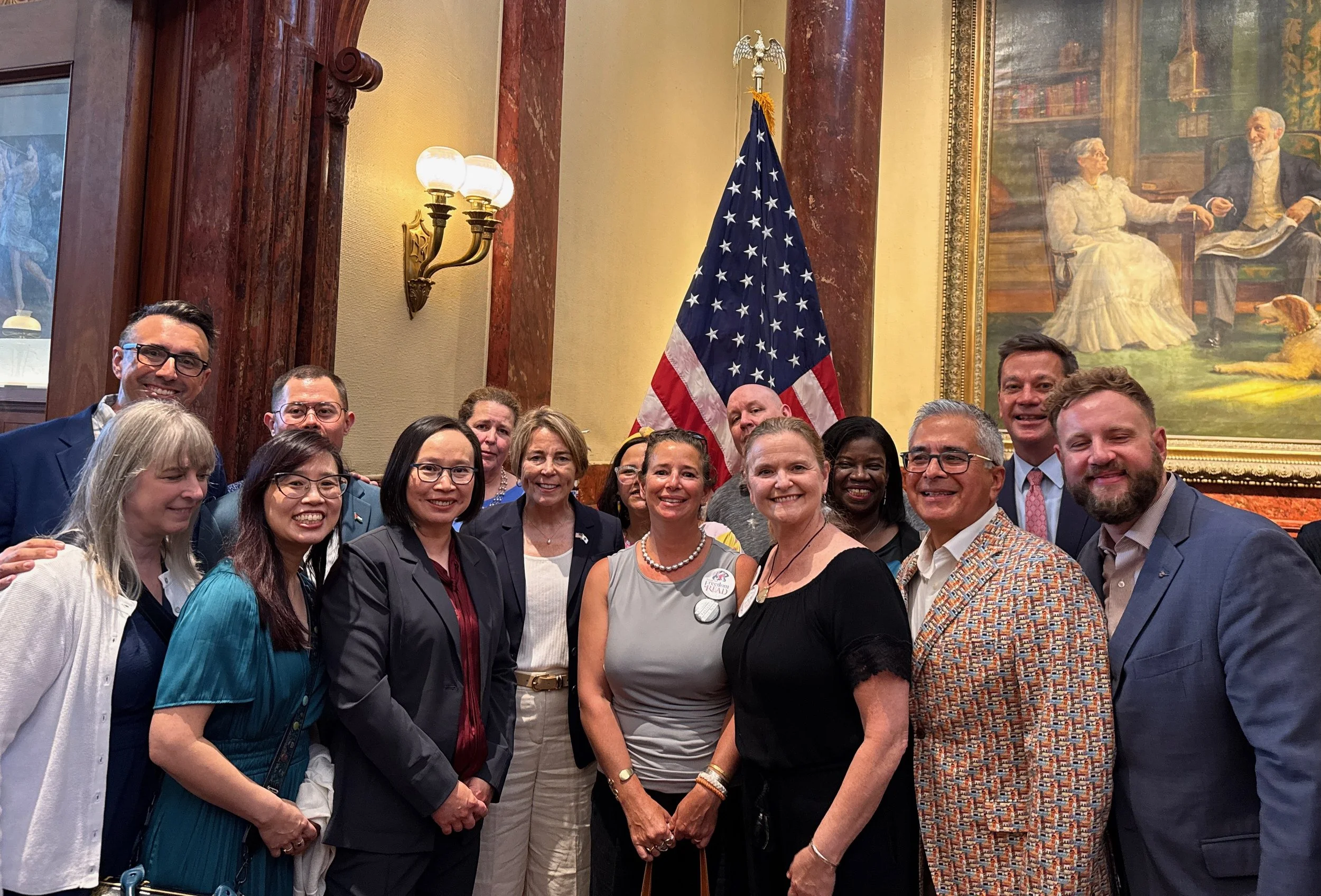 Governor Healey poses with members of Massachusetts Authors Against Book Bans at the Franklin Public Library on Aug. 10, 2026