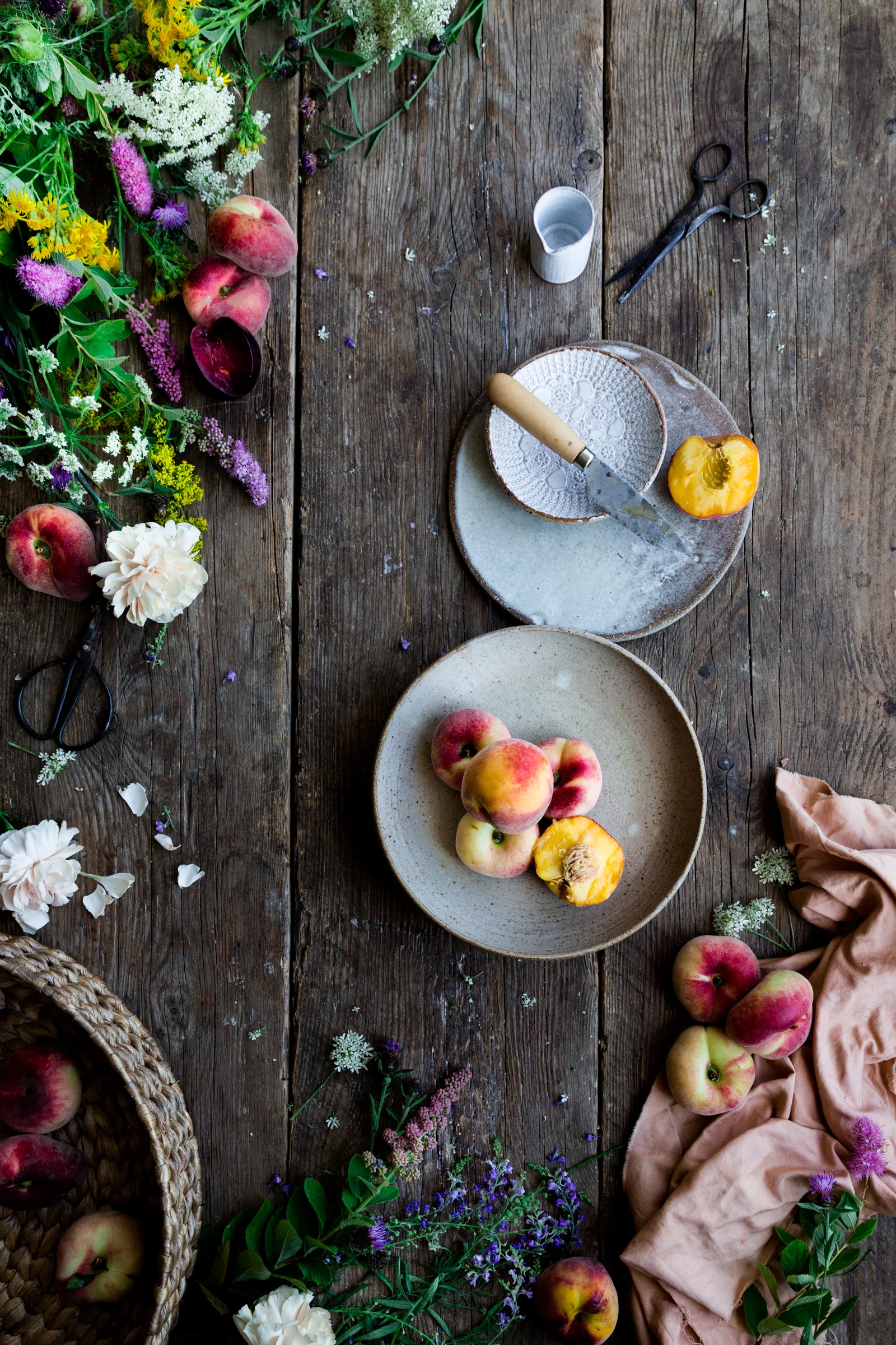 Ceramics pitcher in shot by Nom Living, small patterned side plate by Ayse Habibe Kucuk.