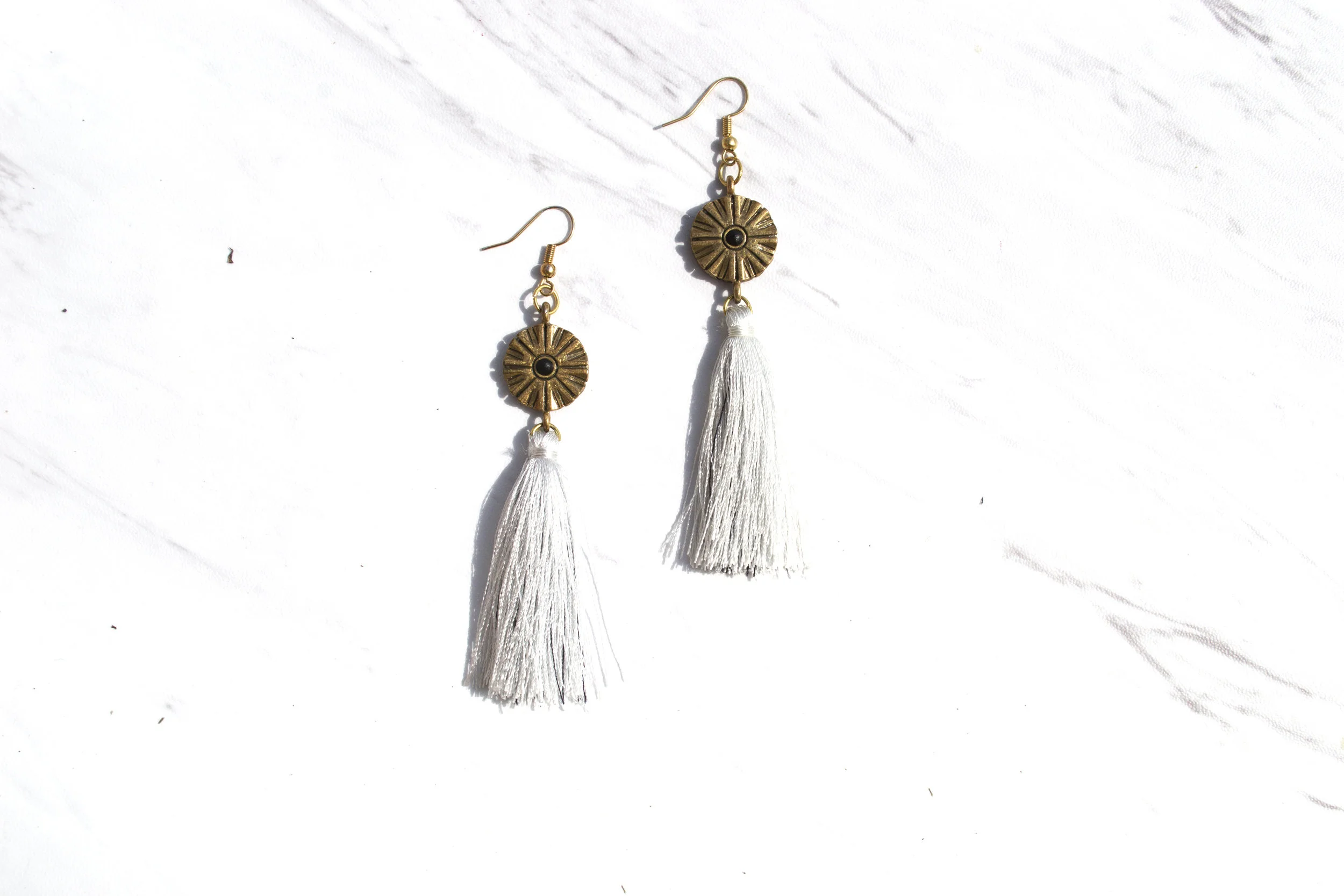 D E C O $35 Handmade. White tassel with hints of black thread. 21mm 18k gold plated short fish hook. Nickel-free. Please contact me for other color combinations
