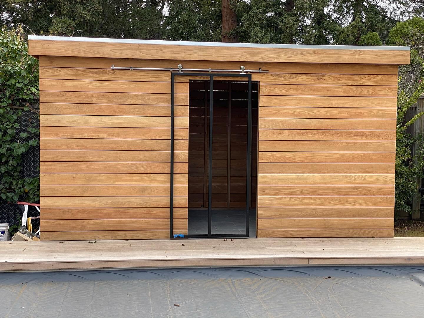 Teak Pool Cabana coming along nicely! Featuring stone floor, shower and waterproof storage.