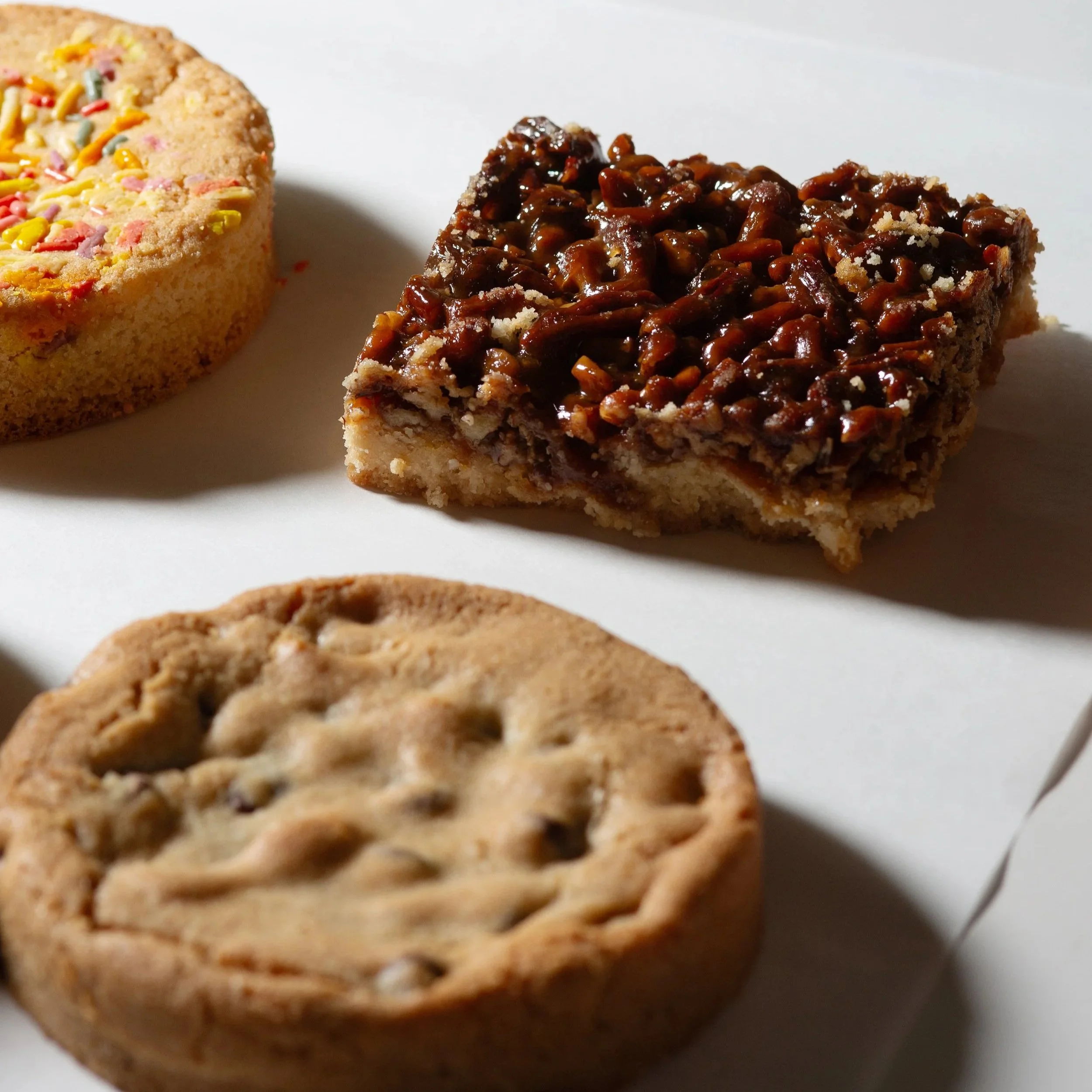 Baked goods sit atop parchment paper inside the famous bakery, Newcastle Bakery in Downtown Brunswick, GA