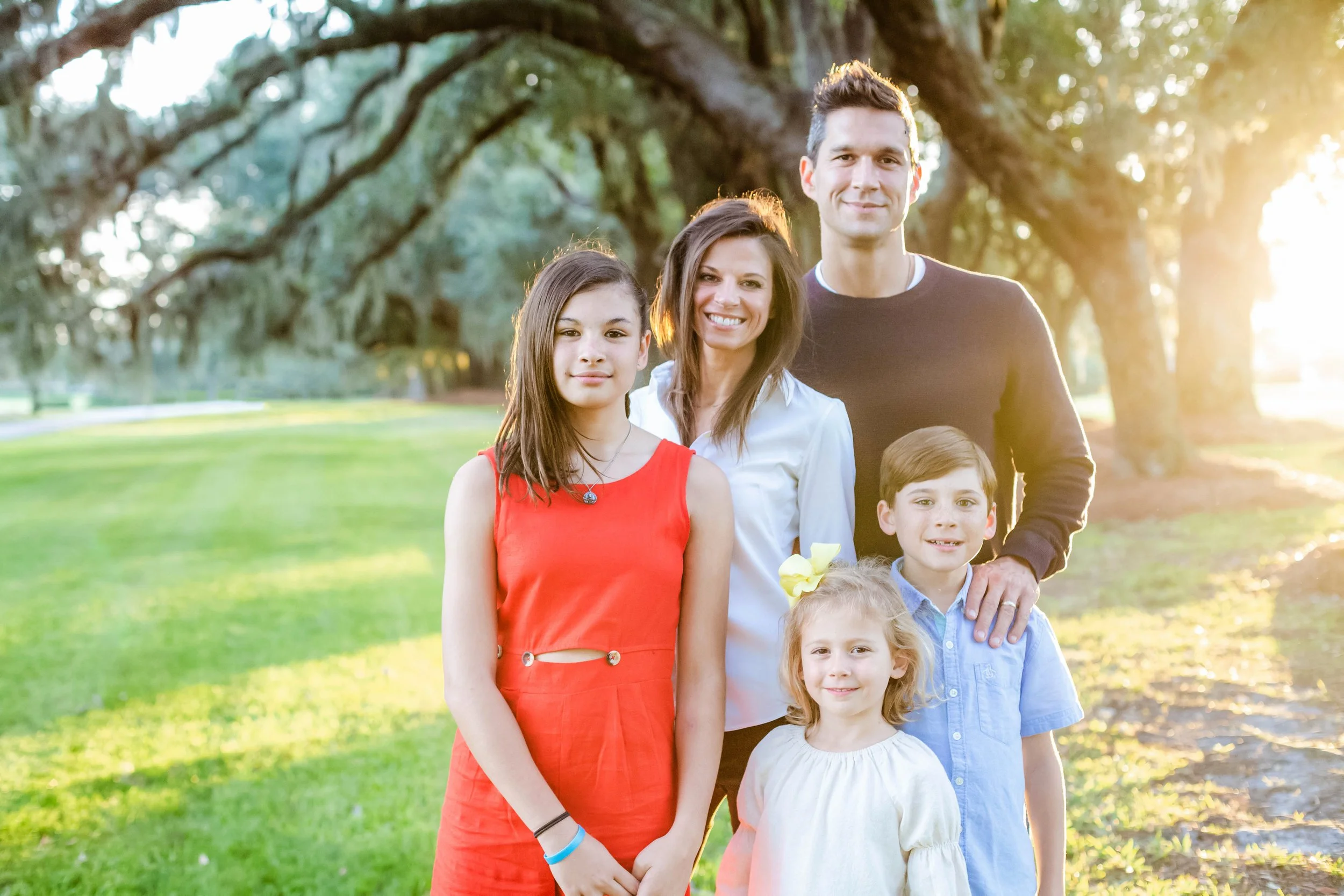 Family connection captured during golden hour by an St. Simons Island storytelling photographer
