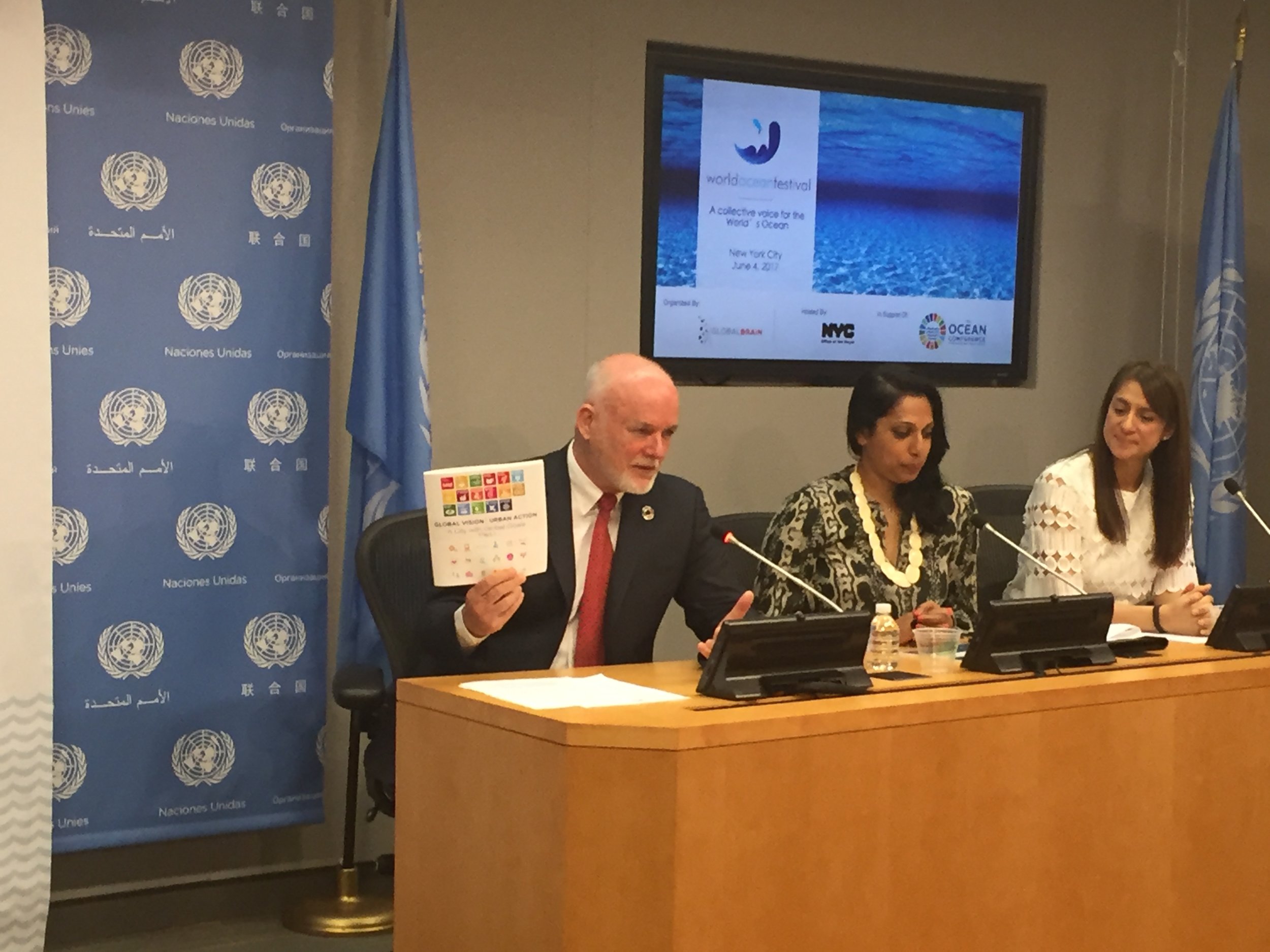 At the World Ocean Festival announcement, President of the UN General Assembly, Ambassador Peter Thomson, showcased the Office for International Affairs’ A City with Global Goals booklet that maps the synergies between the UN Sustainable Development Goals and OneNYC. From L to R: Ambassador Peter Thomson, President, UN General Assembly; Penny Abeywardena, Commissioner, Mayor’s Office for International Affairs; Natalia Vega-Berry, Founder/CEO, Global Brain