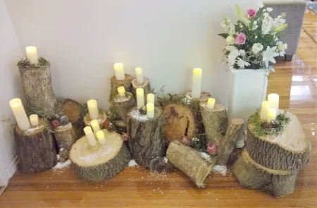 LED Pillar Candles on logs