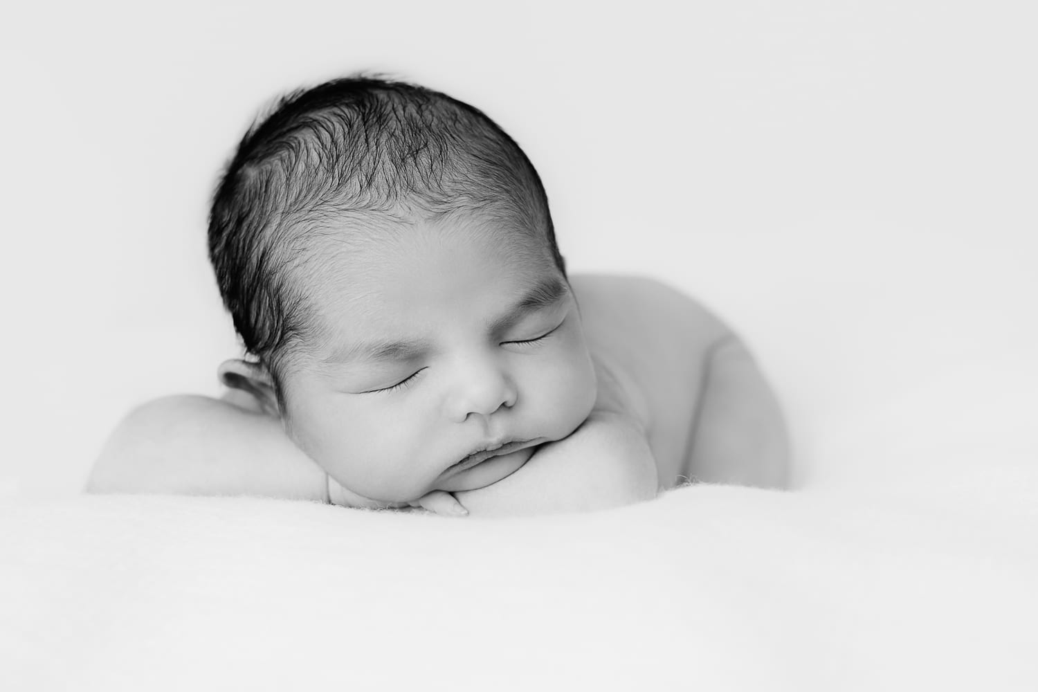 newborn-sweet-baby-alseep-2x3.jpg