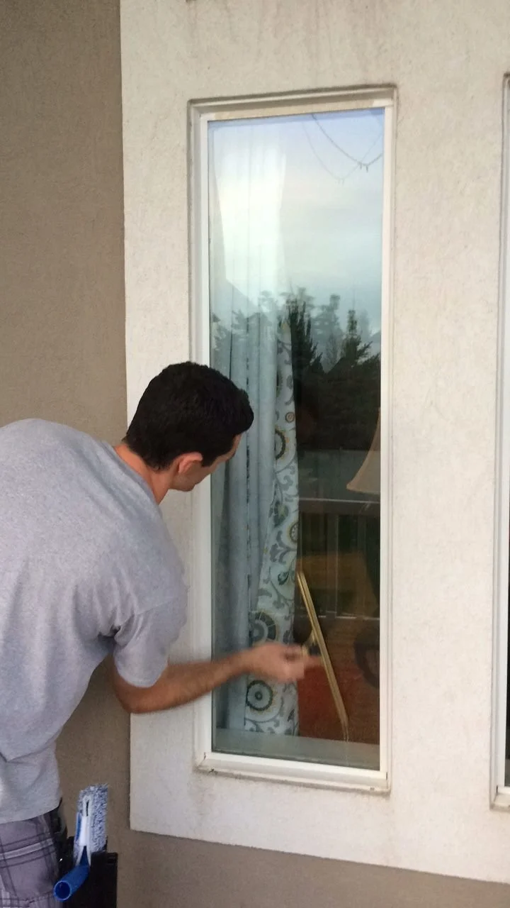 kurt-cleaning-a-window.jpg