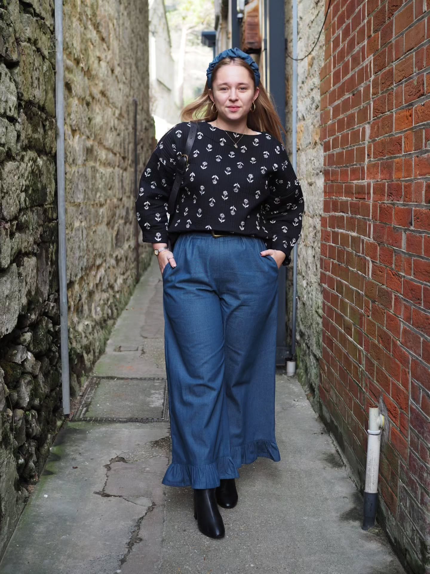 Amy's been having fun styling up our new Gillian frill trousers in mid wash denim. As you can see, you can dress them up or wear them casually &mdash; they work whatever your mood. We make-to-order here from our little studio on the Isle of Wight, so