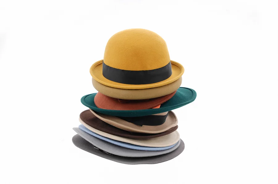 bigstock-Stacked-of-many-woman-hat----168023384.jpg
