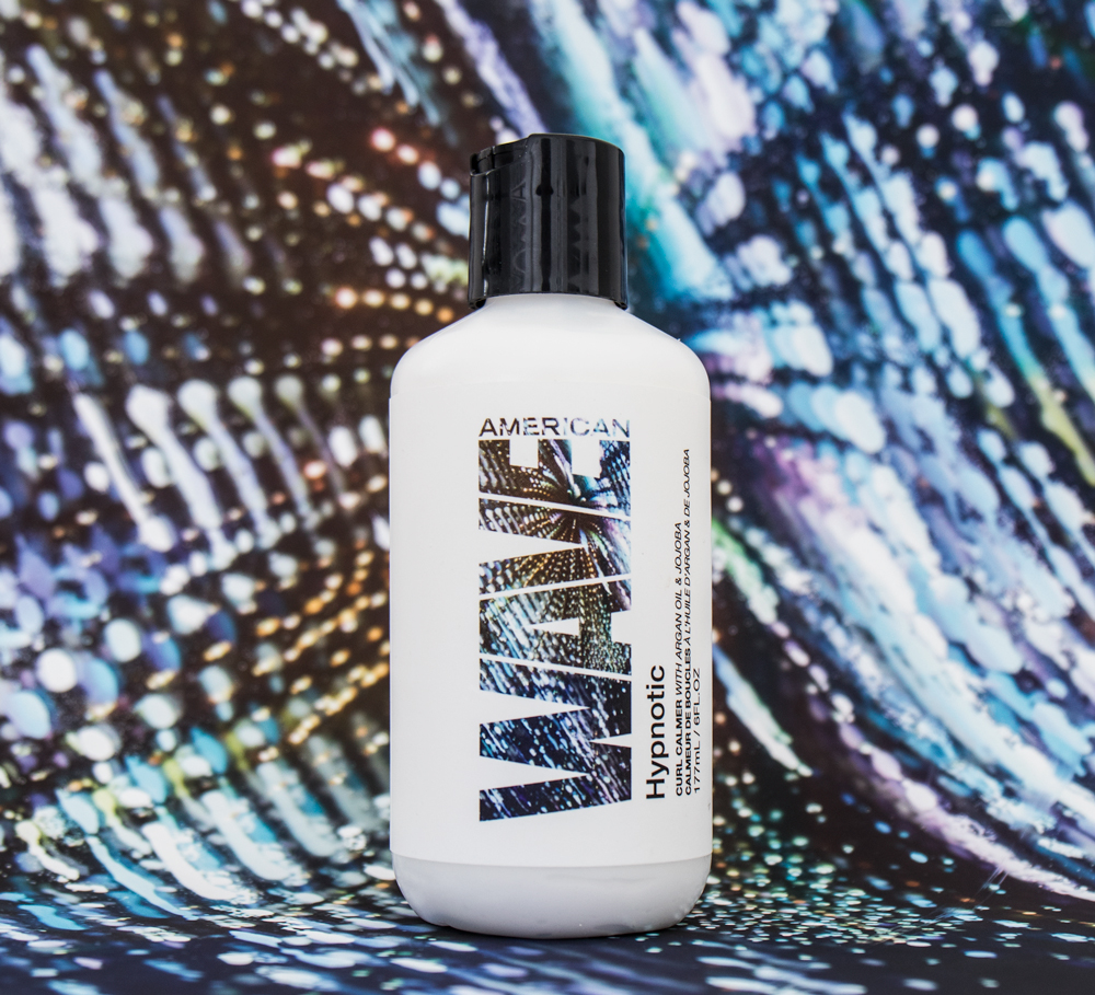Hypnotic Malnourished curls hunger for hydration; it’s what provides the strength for textures to form a full, curvaceous shape. Hypnotic compels curls to perk up with a bewitching blend of exotic emollients. Keeps curls hydrated, defined, soft and shiny; improves textural definition; makes abundant, resilient, energized wave and curl patterns.