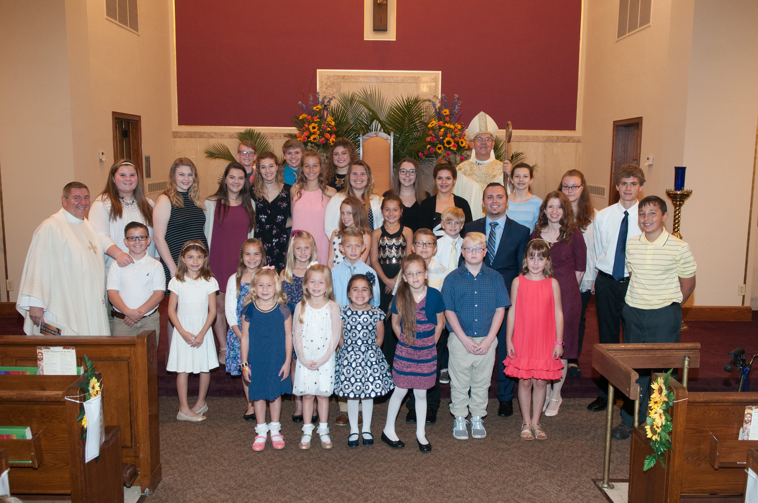 Youth and Teen Choirs with Bishop.jpg