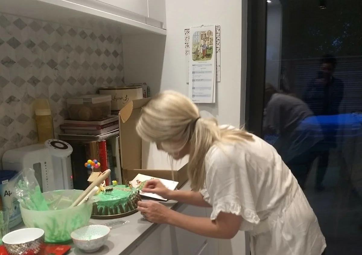 Here I am , putting the finishing touches to Rupert's First Birthday cake....