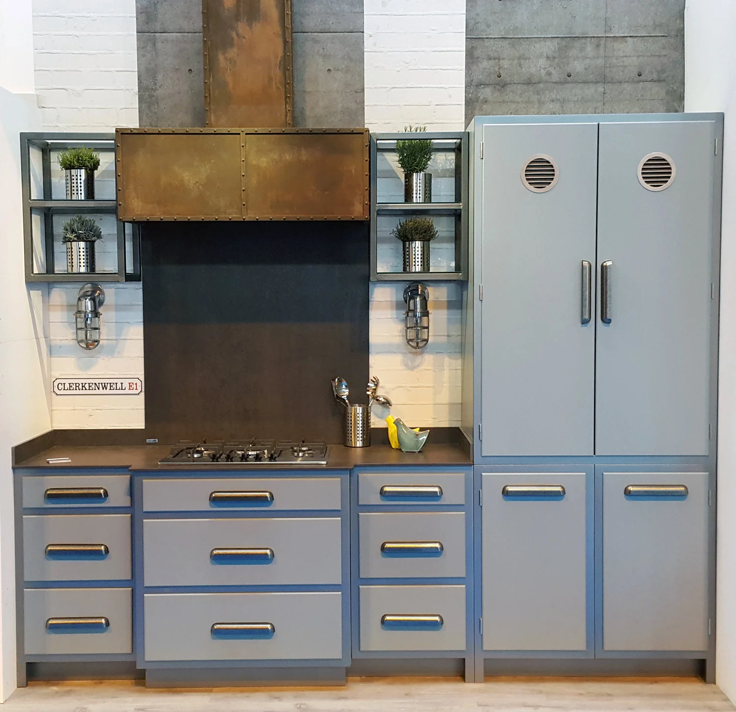 with accent handles, a feature extractor hood and even air vents in the tall doors, our clerkenwell kitchen will transform you right back to the 60’s!