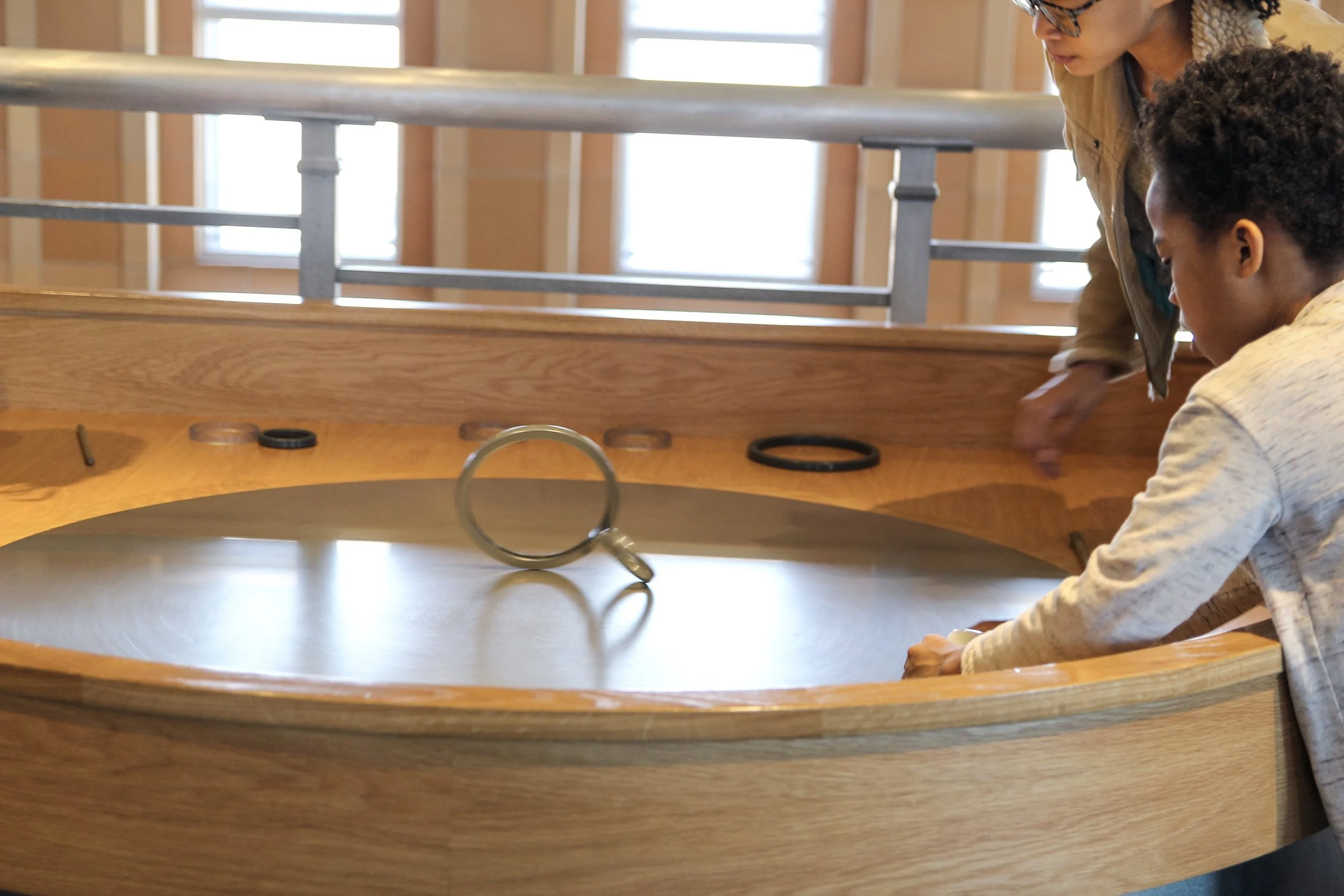 The silver center was constantly spinning. The goal was to put your ring in and see if you could get it to stay upright.
