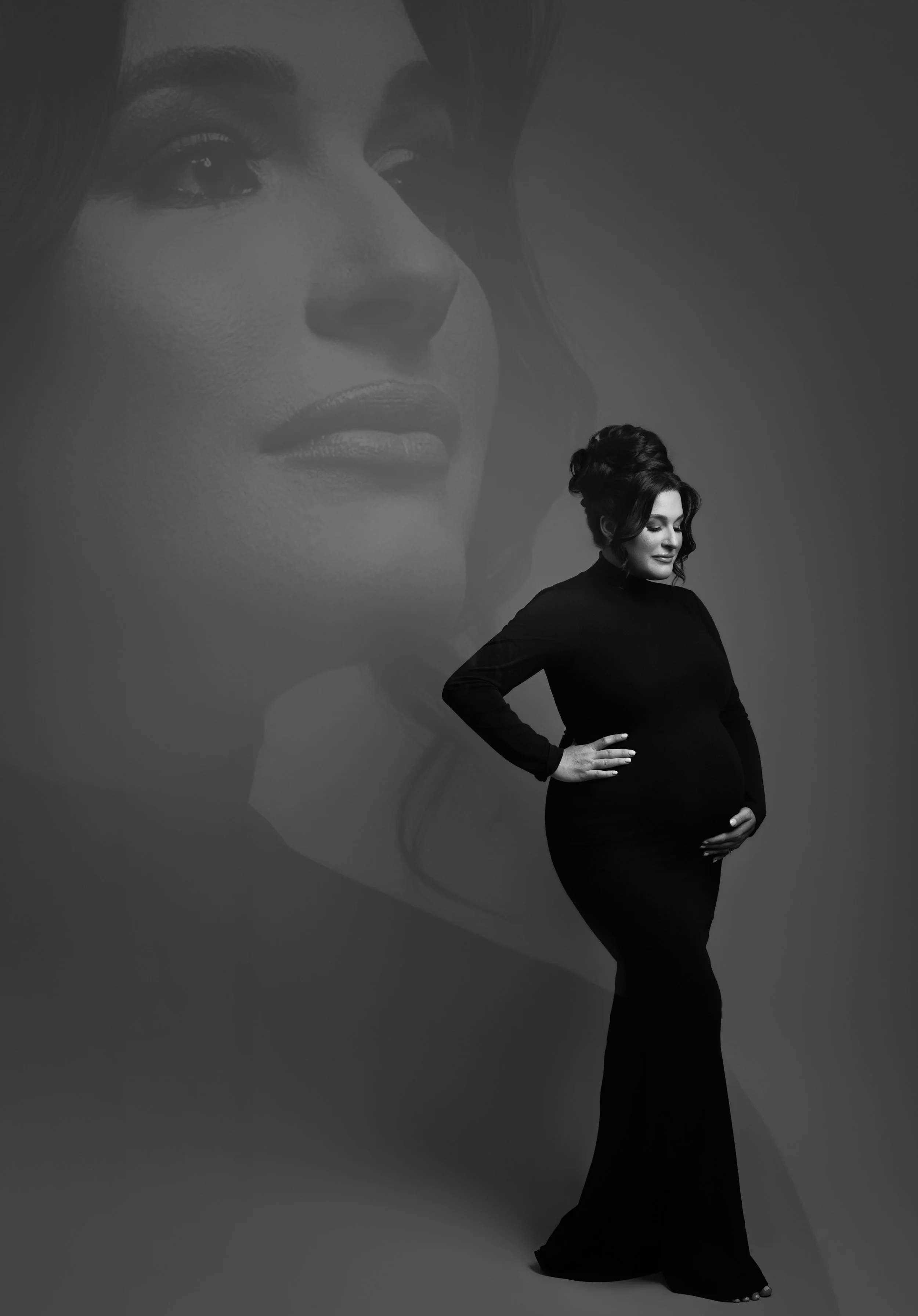Black-and-white editorial maternity portrait with a dramatic double-exposure effect, photographed in a Dallas studio.