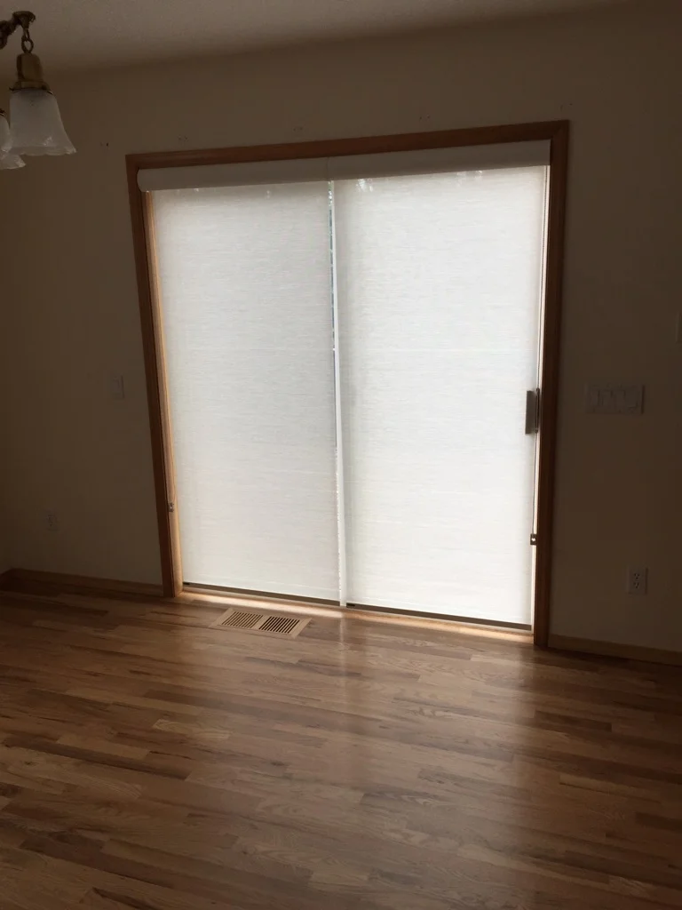 Roller shade on sliding door
