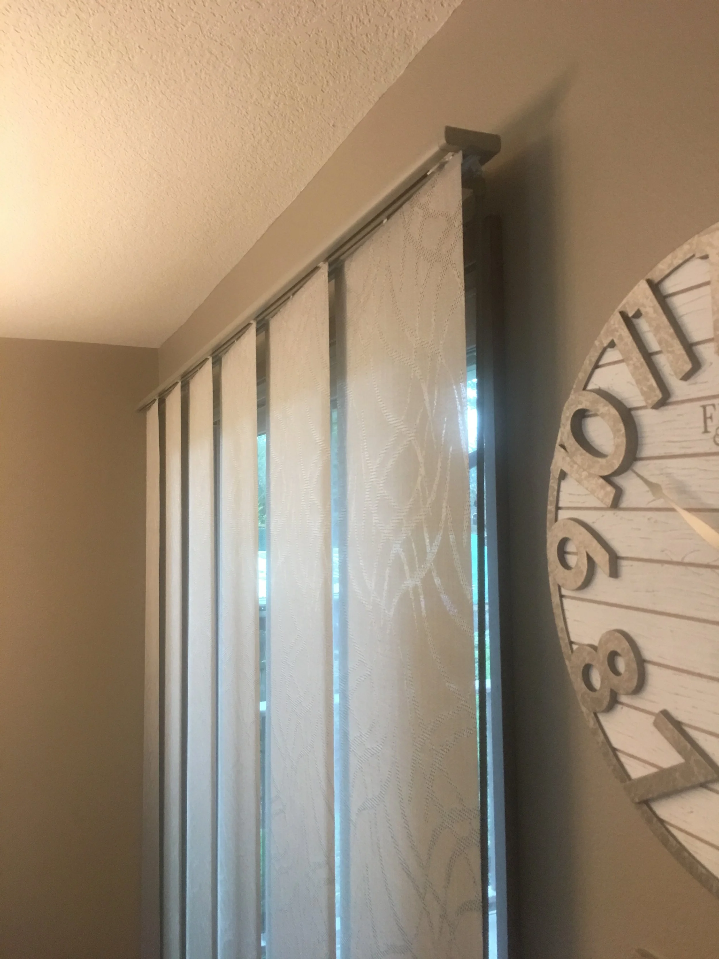 Gliding window panels on sliding door
