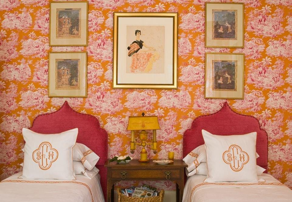 BR twin beds with orange-pink toile.jpg