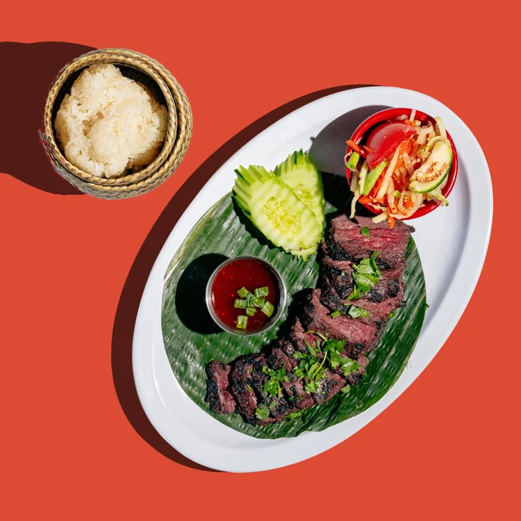 Grilled crying tiger steak with jeaw sauce and sticky rice