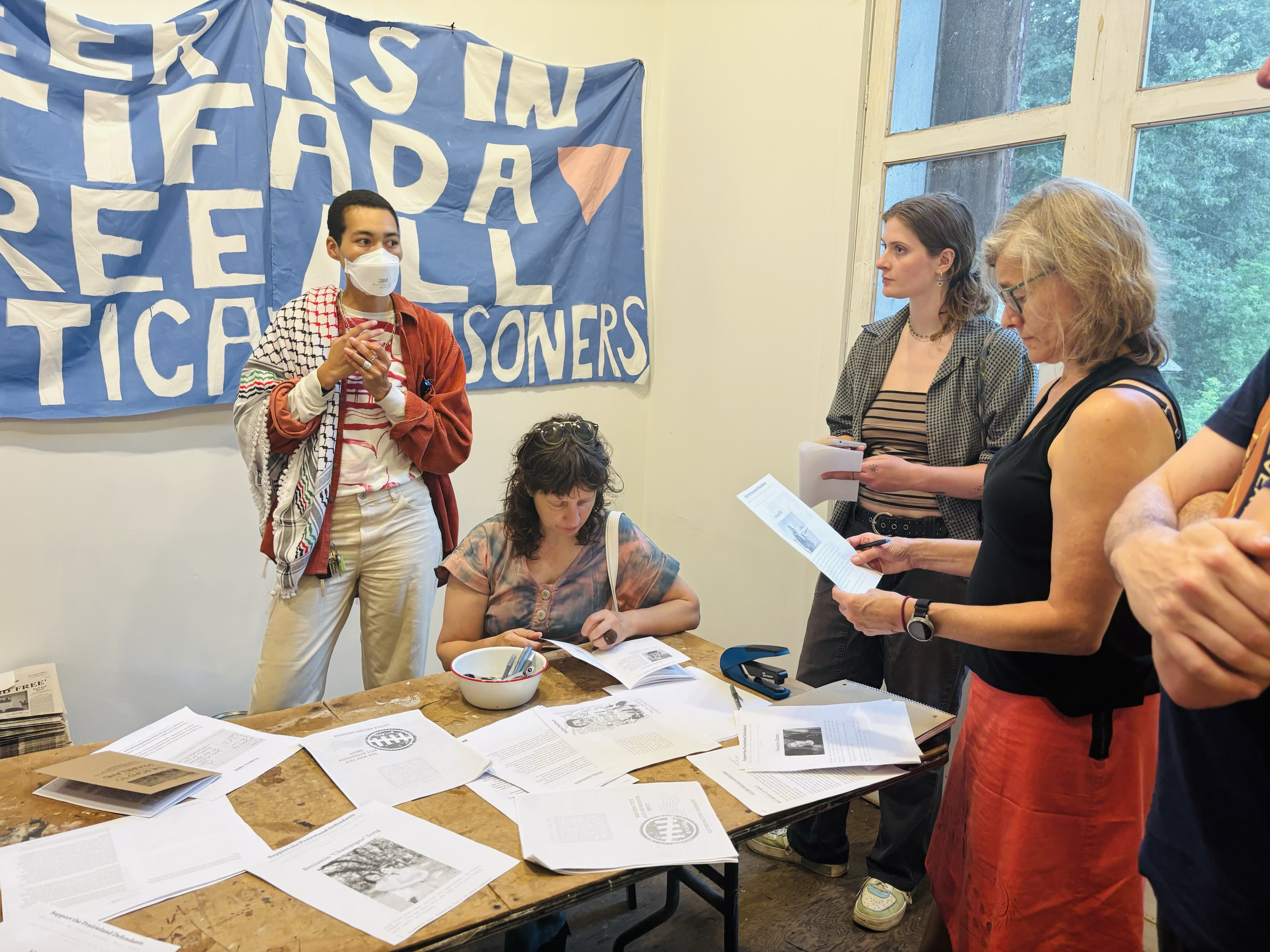 Artist Lukaza Branfman-Verissimo activating her piece in Red Flags For Everyone