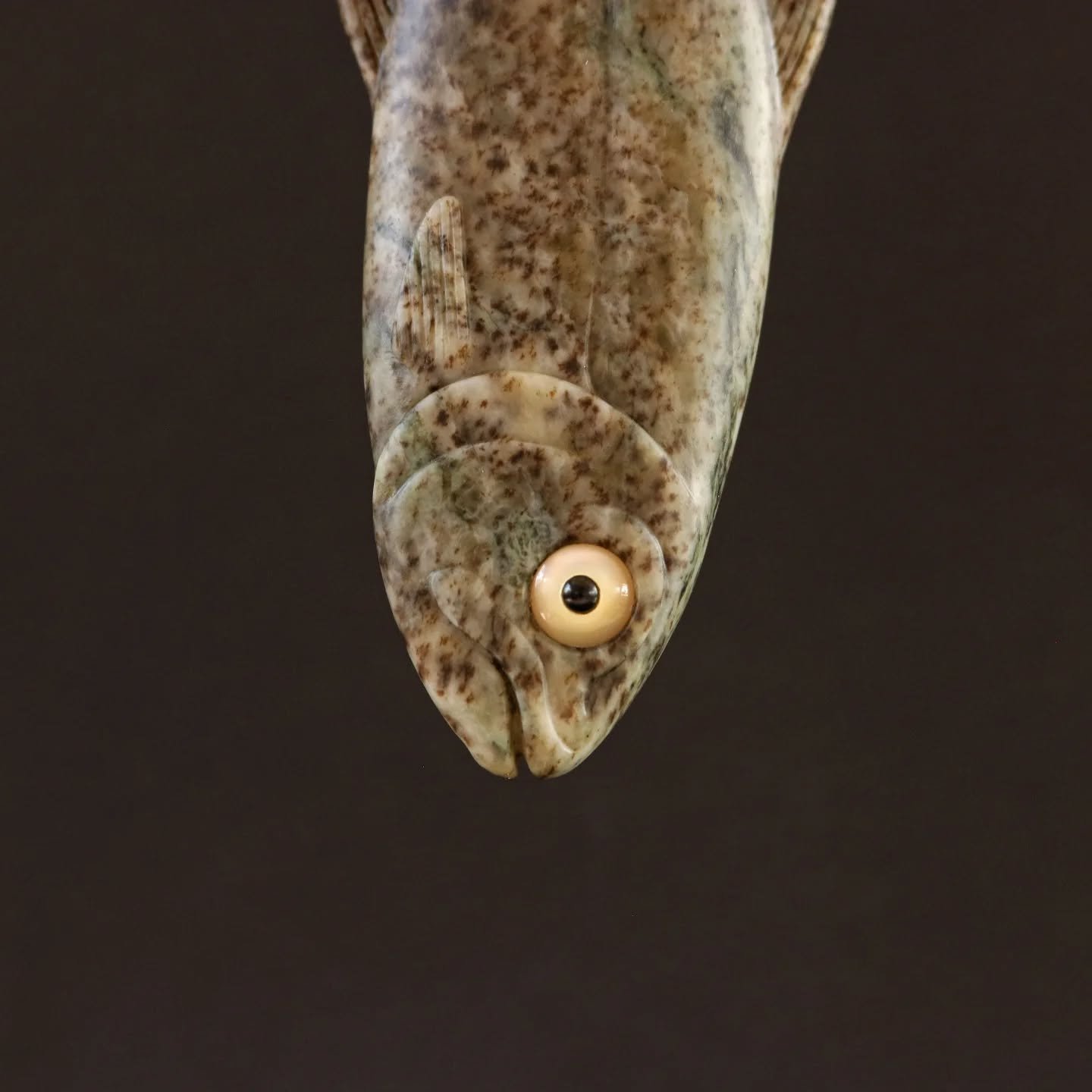 Here's fish number two in a four fish series. I was particularly happy with how this one turned out. It is modelled on a rainbow trout fry,  it was quite the task to find a stone to match those particular colouration's. Consequently this piece is clo