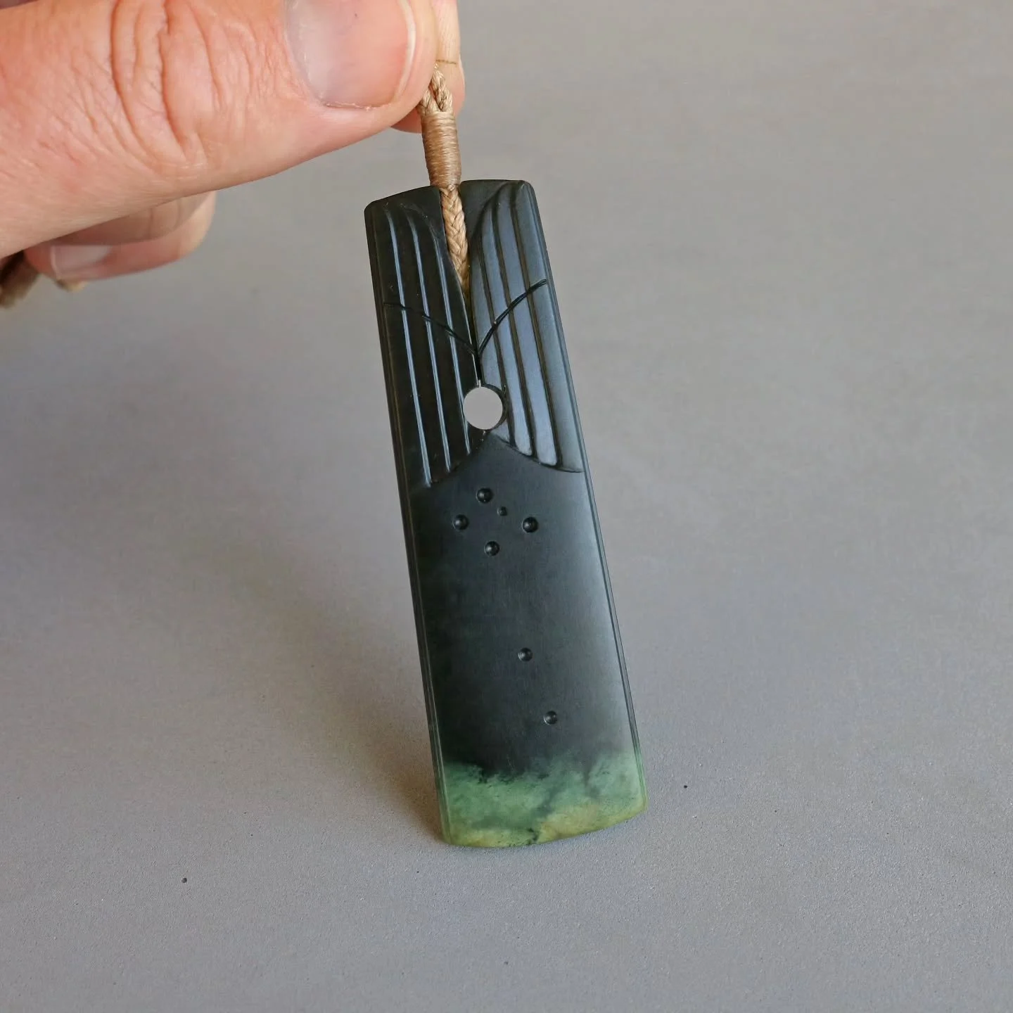 I was going through some older photos of pieces last night and I found this custom piece I made for a customer a few year's ago. Not the best photos but it brings the constant need to make Toki that much closer to the surface. 

#pounamu #toki #adze 