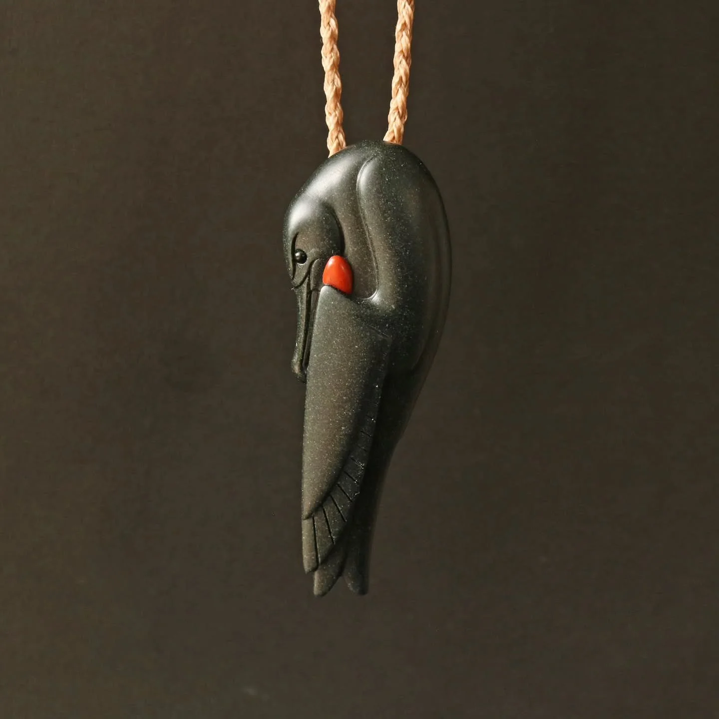 Here's a bird that is only seldomly seen in Aotearoa but are common throughout the tropical and subtropical Pacific. This piece is modelled on the Greater Frigate bird, specifically a male with his bright red gular sac, which they inflate with air to