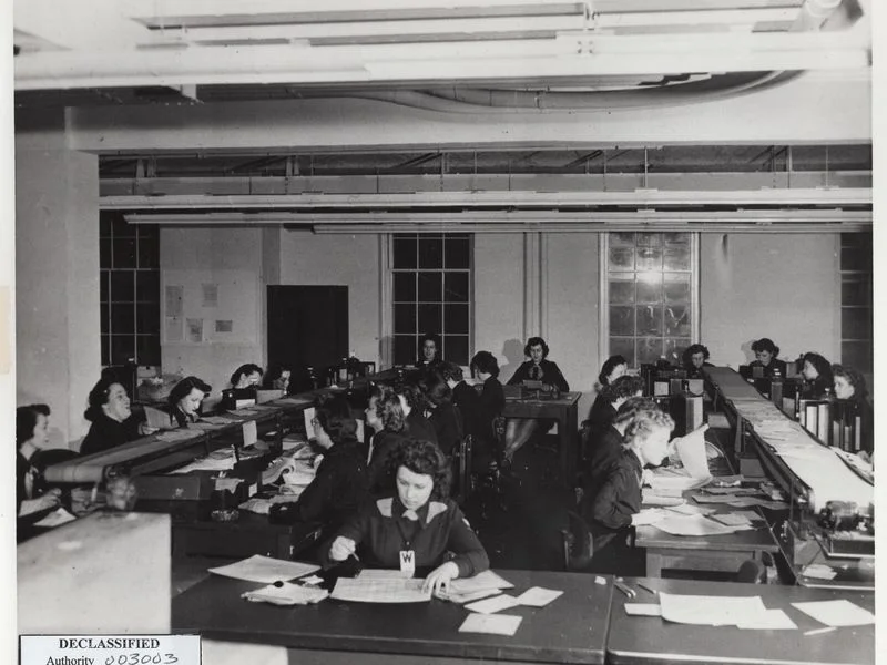 Thousands of women tirelessly worked in close quarters throughout the war breaking codes for the Army and Navy. Vowed to secrecy, they have long gone unrecognized for their wartime achievements. (National Archives and Records Administration)