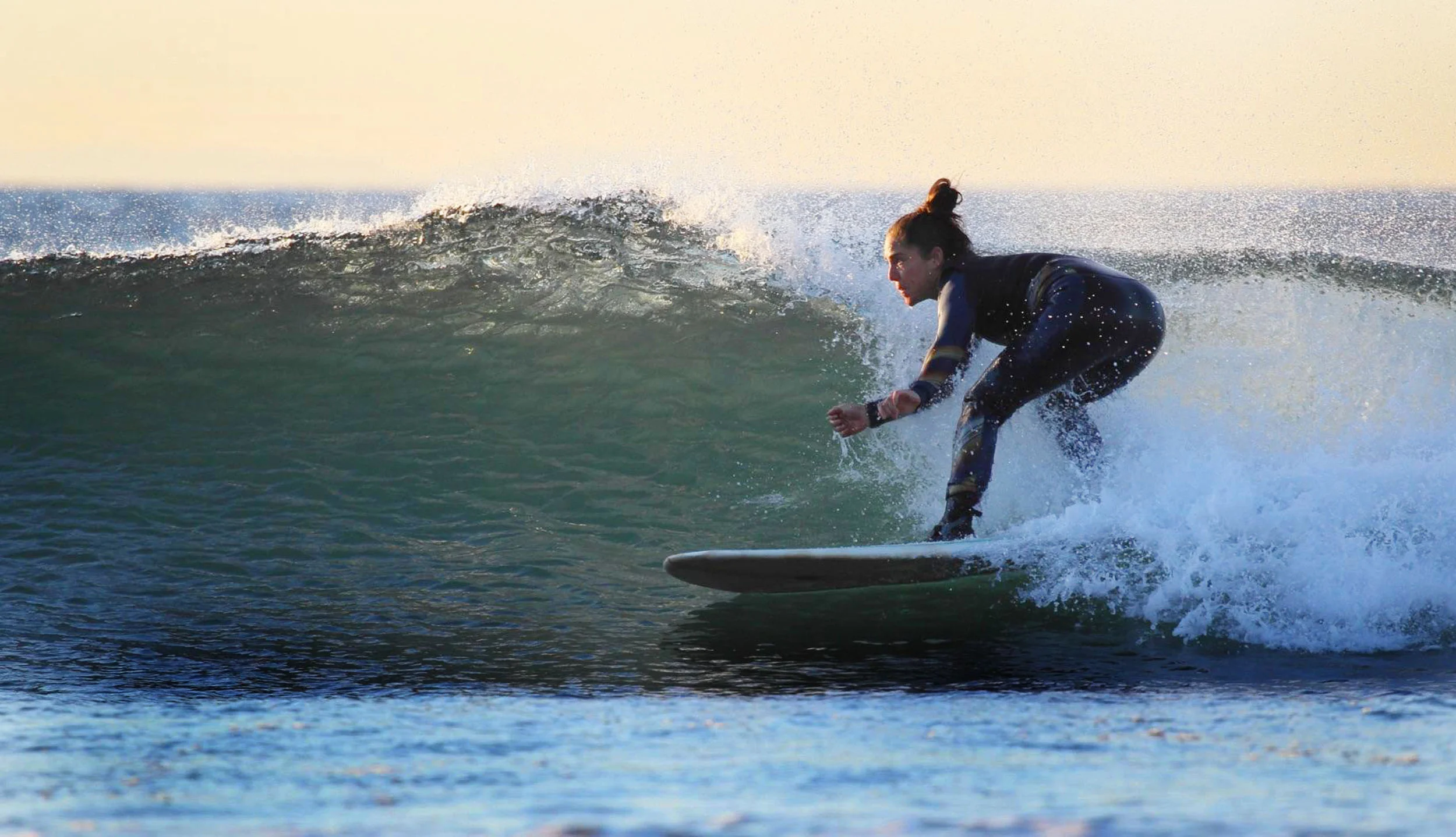 Shawna started surfing with Surfer's ED in 2013.
