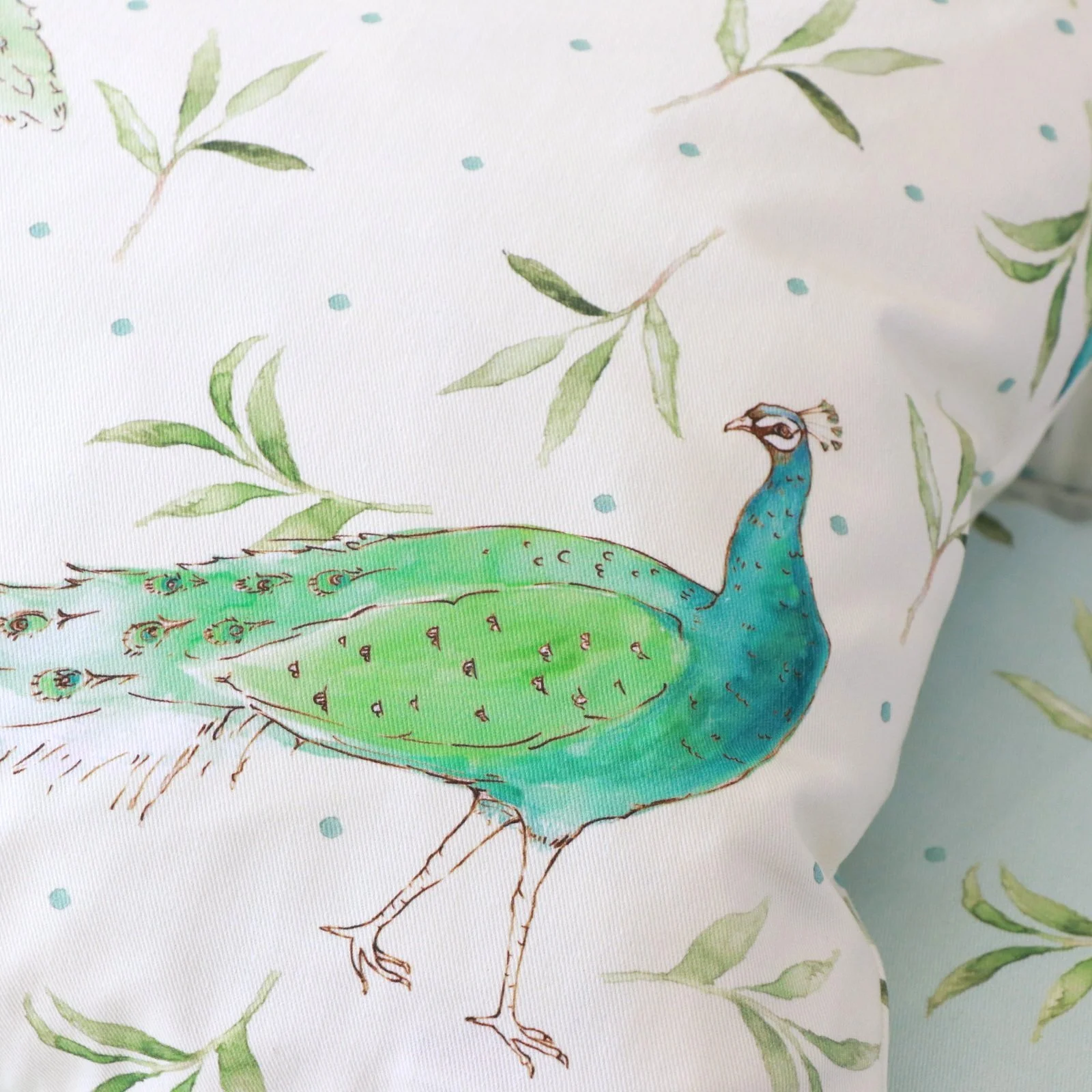 Colourful peacock cushion