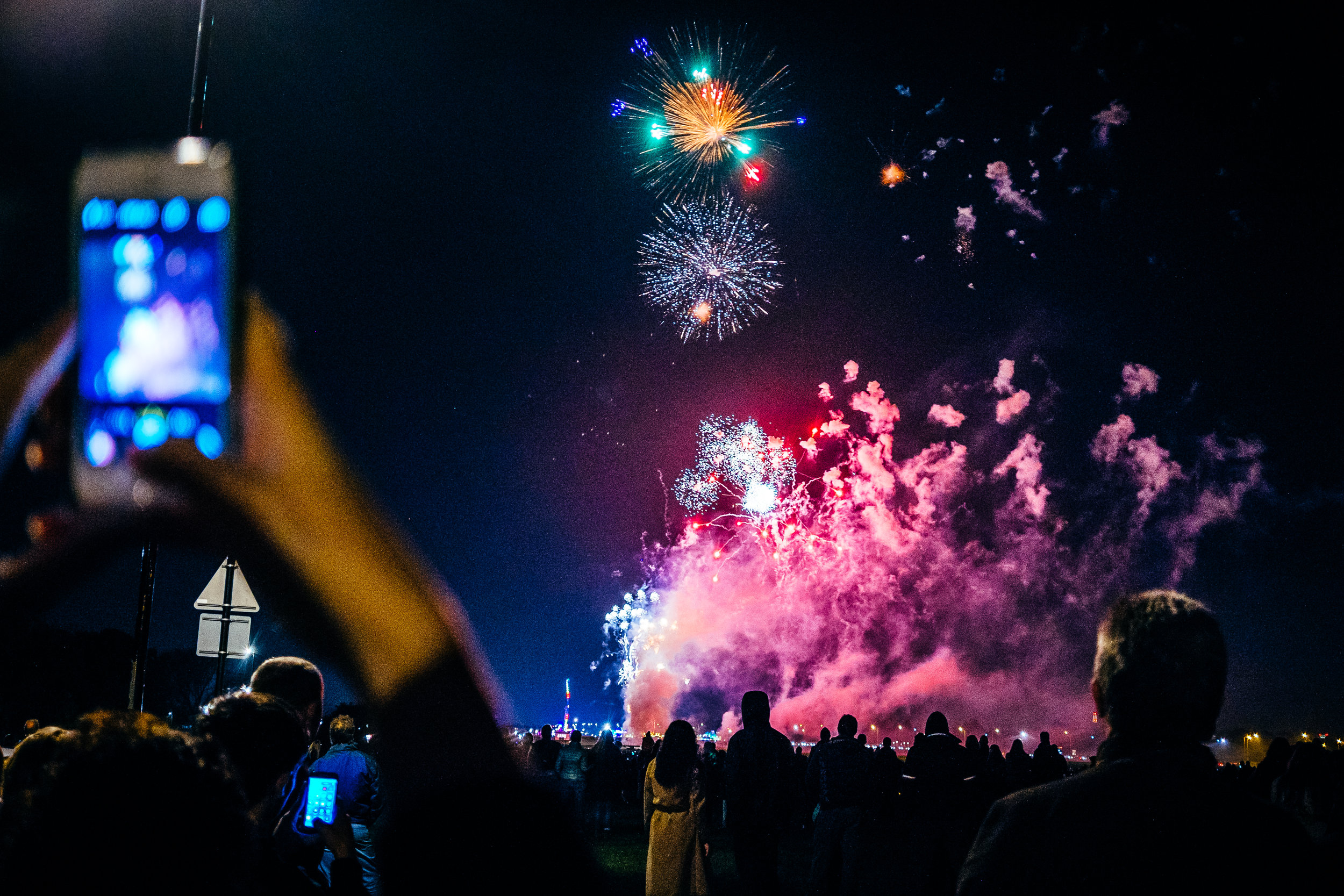  Onlookers watch the fireworks display celebrating Guy Fawkes night.  - Blackheath, London.  