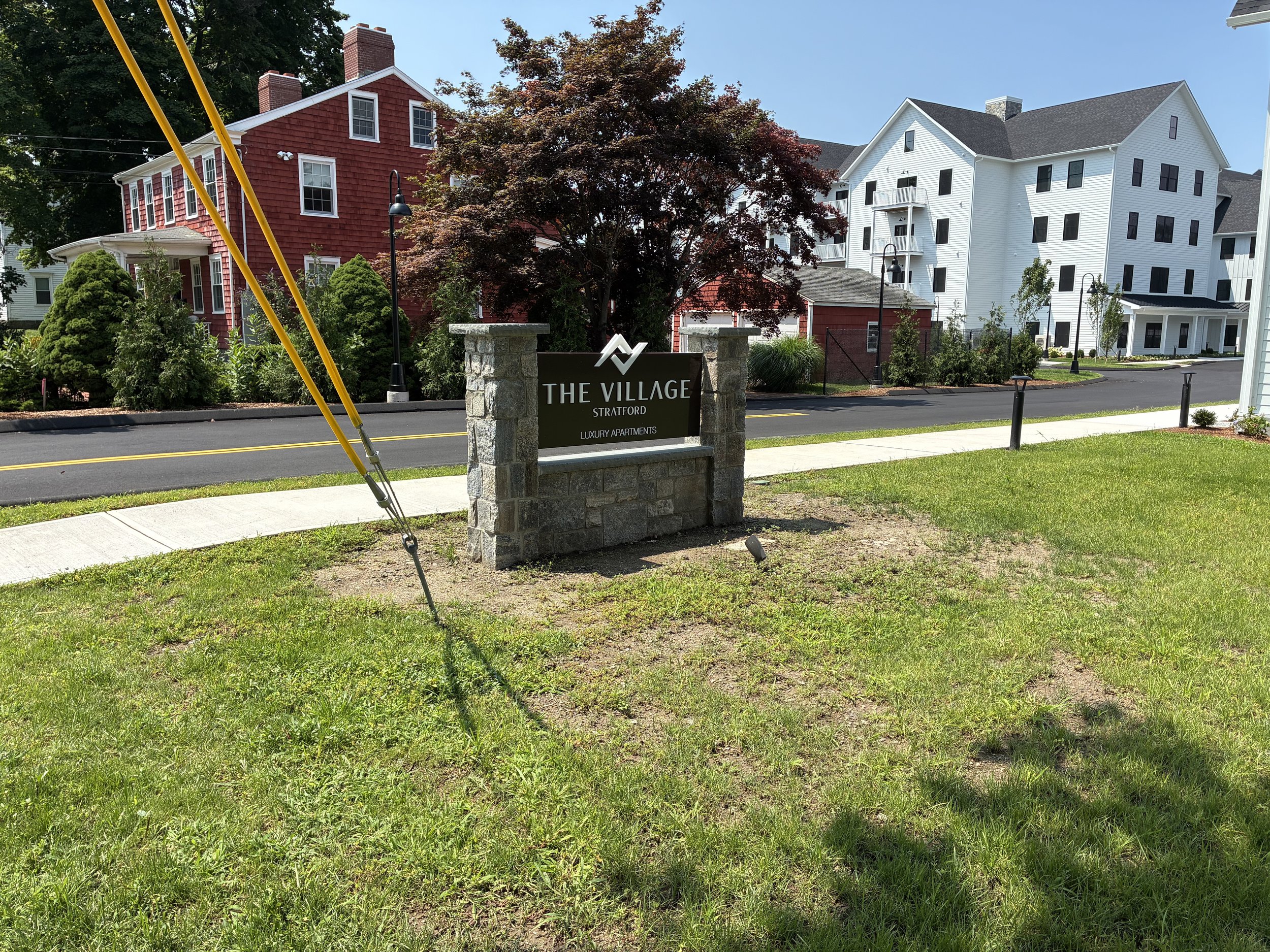 A GLOWUP for the area around the sign for Luxury Apartments in Stratford. August 2026