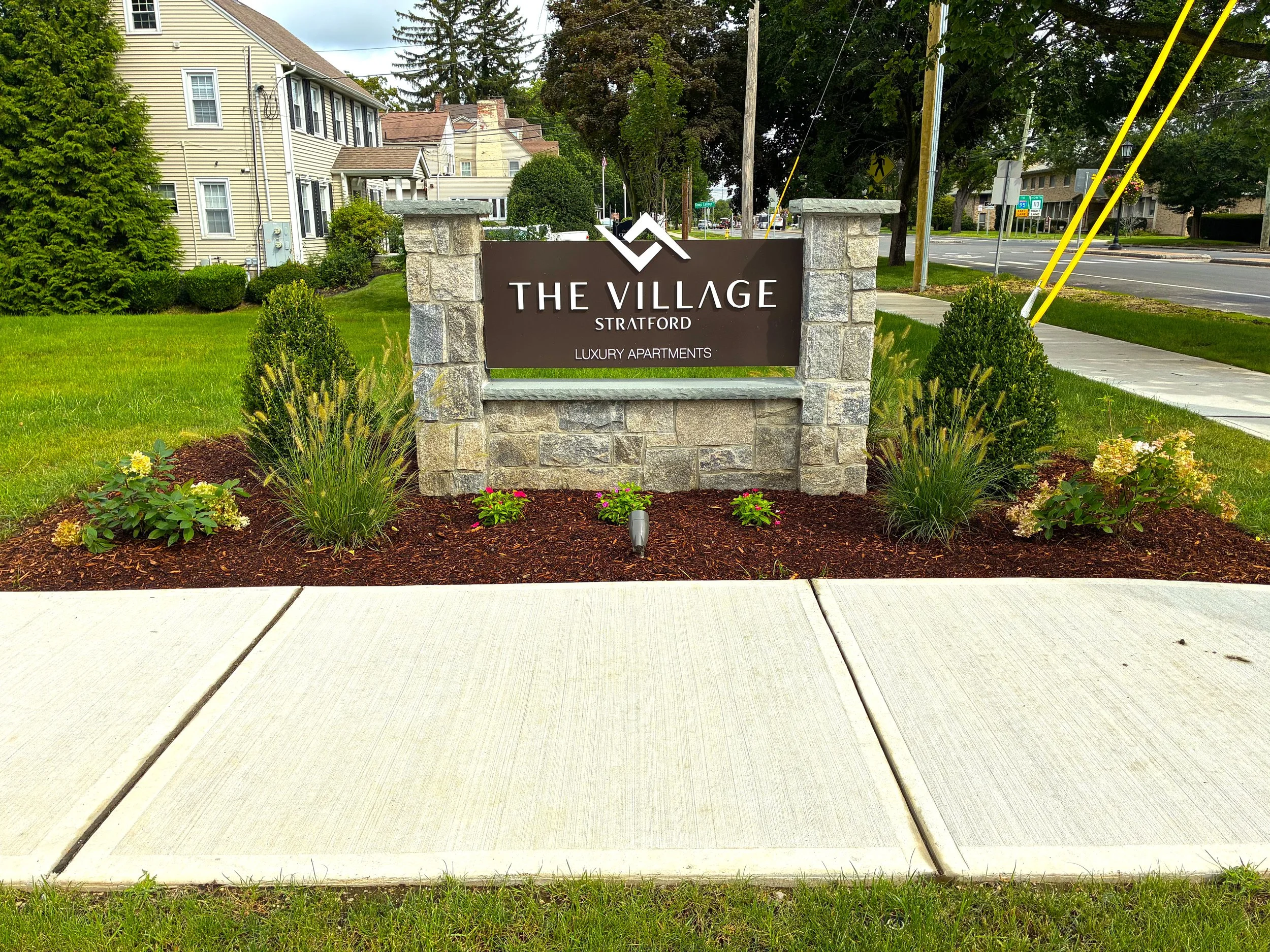 A GLOWUP for the area around the sign for Luxury Apartments in Stratford. August 2026