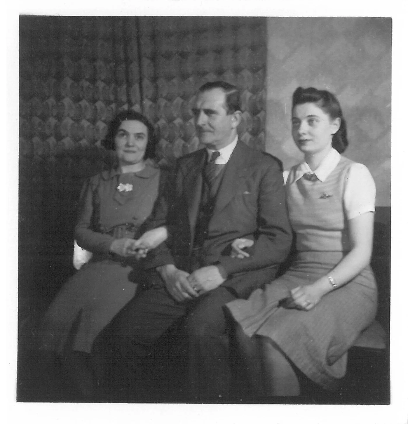 Irene (right) with her parents in their London flat, circa 1940. No known copyright restrictions.
