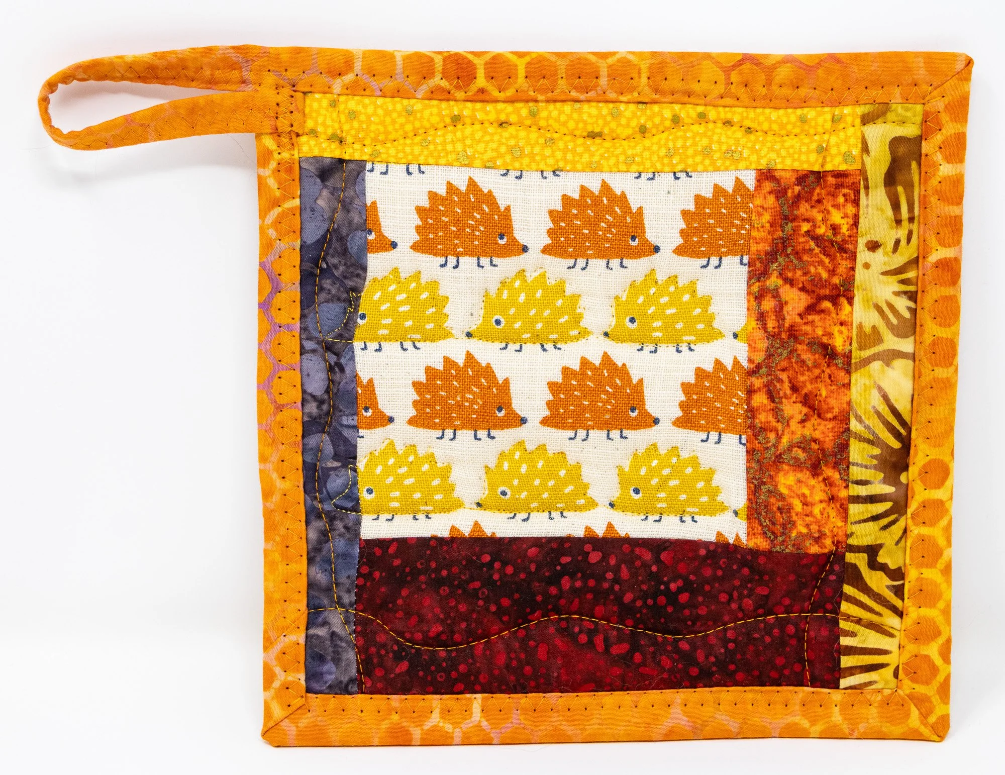 Orange yellow hedgehogs 3 front 2000px.jpg