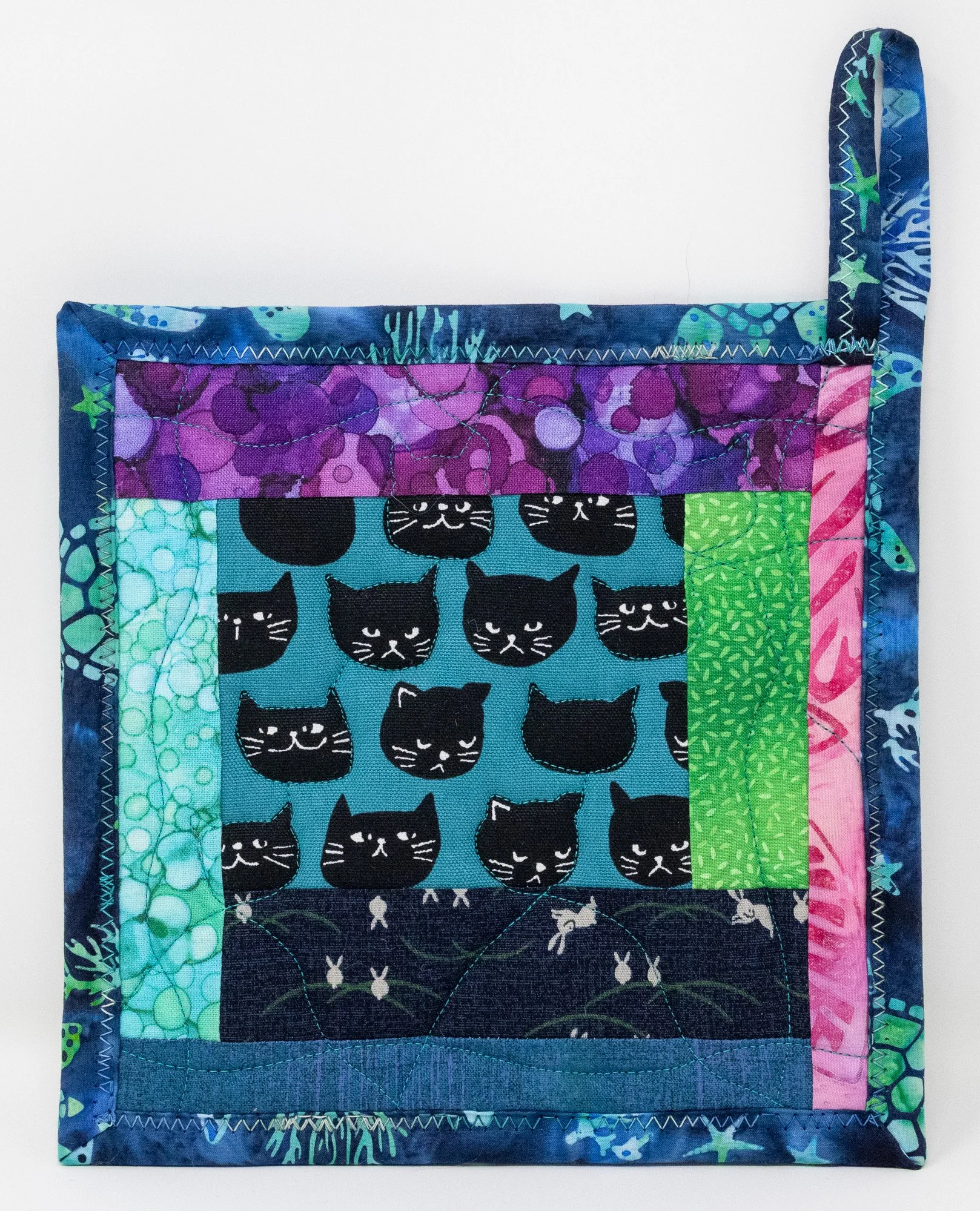 Black cats turquoise 6 front 2000px.jpg