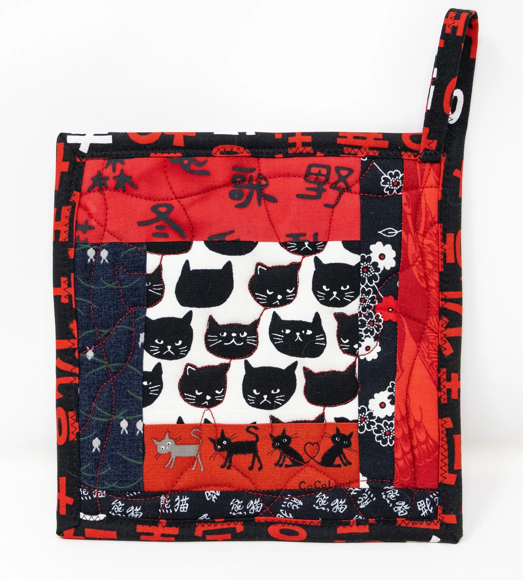 black cats on white w red 4 front 2000px.jpg