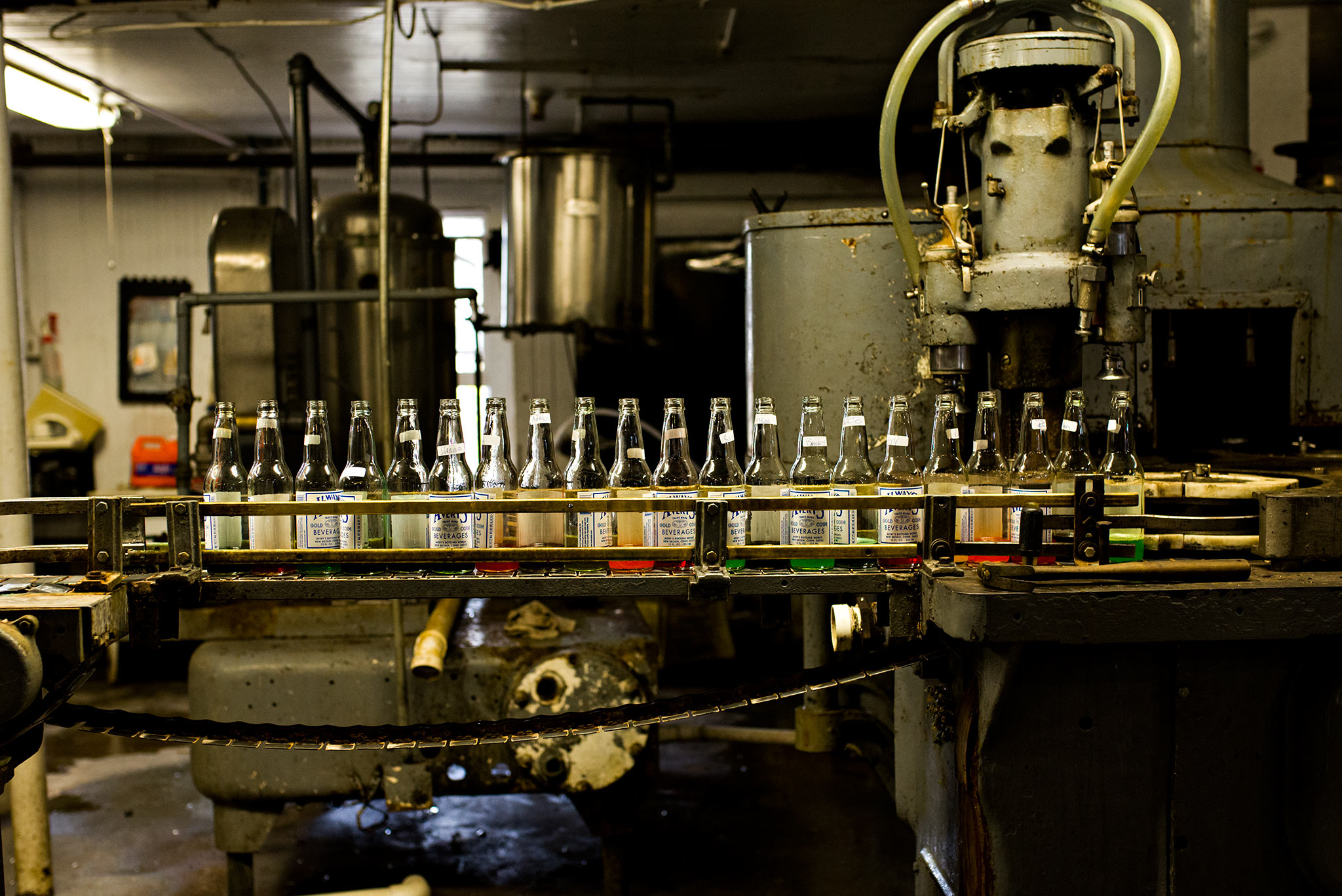 soda bottles filled with flavor on machine averys soda new britain connecticut photography